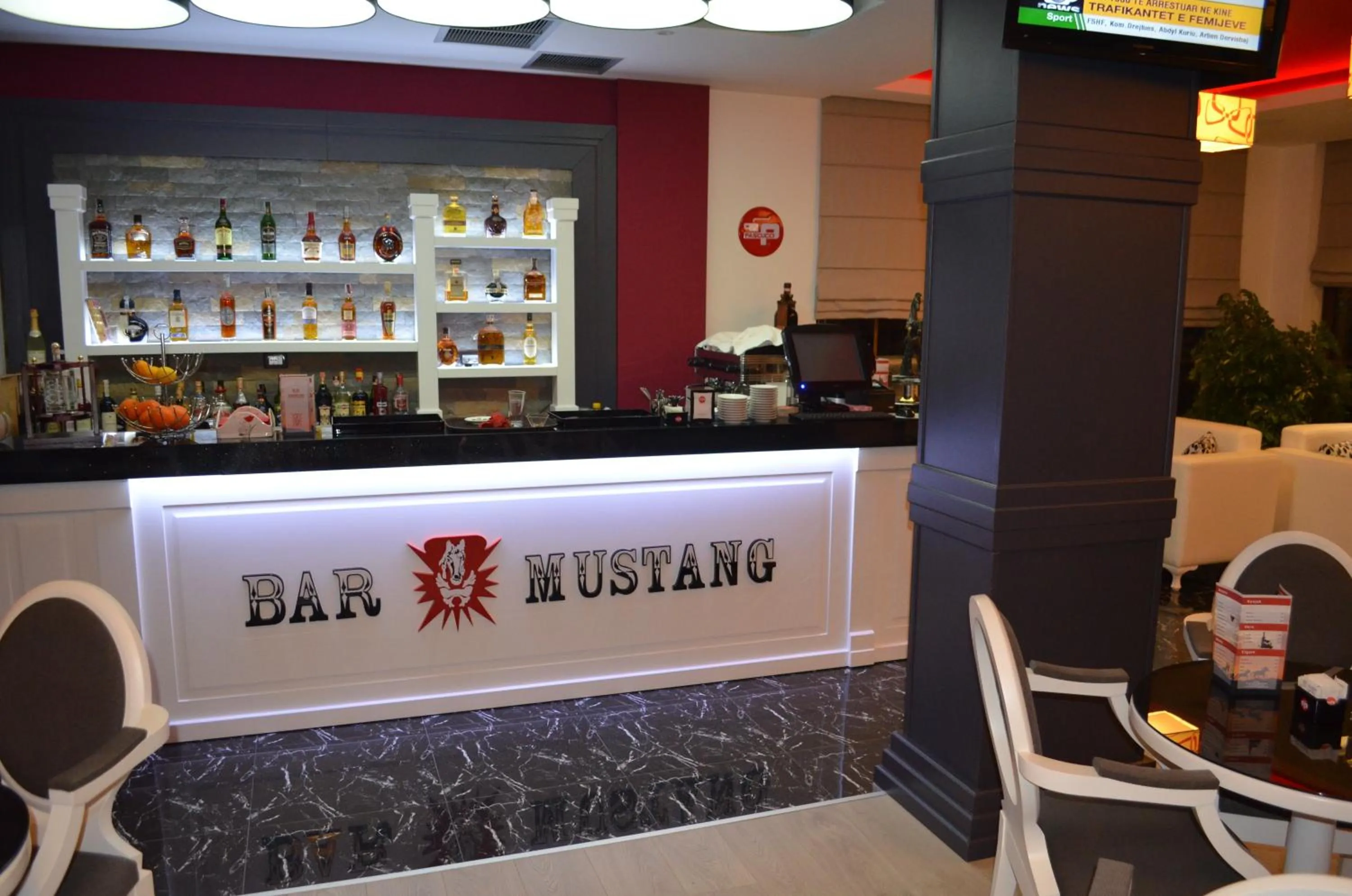 Property logo or sign in Hotel Mustang