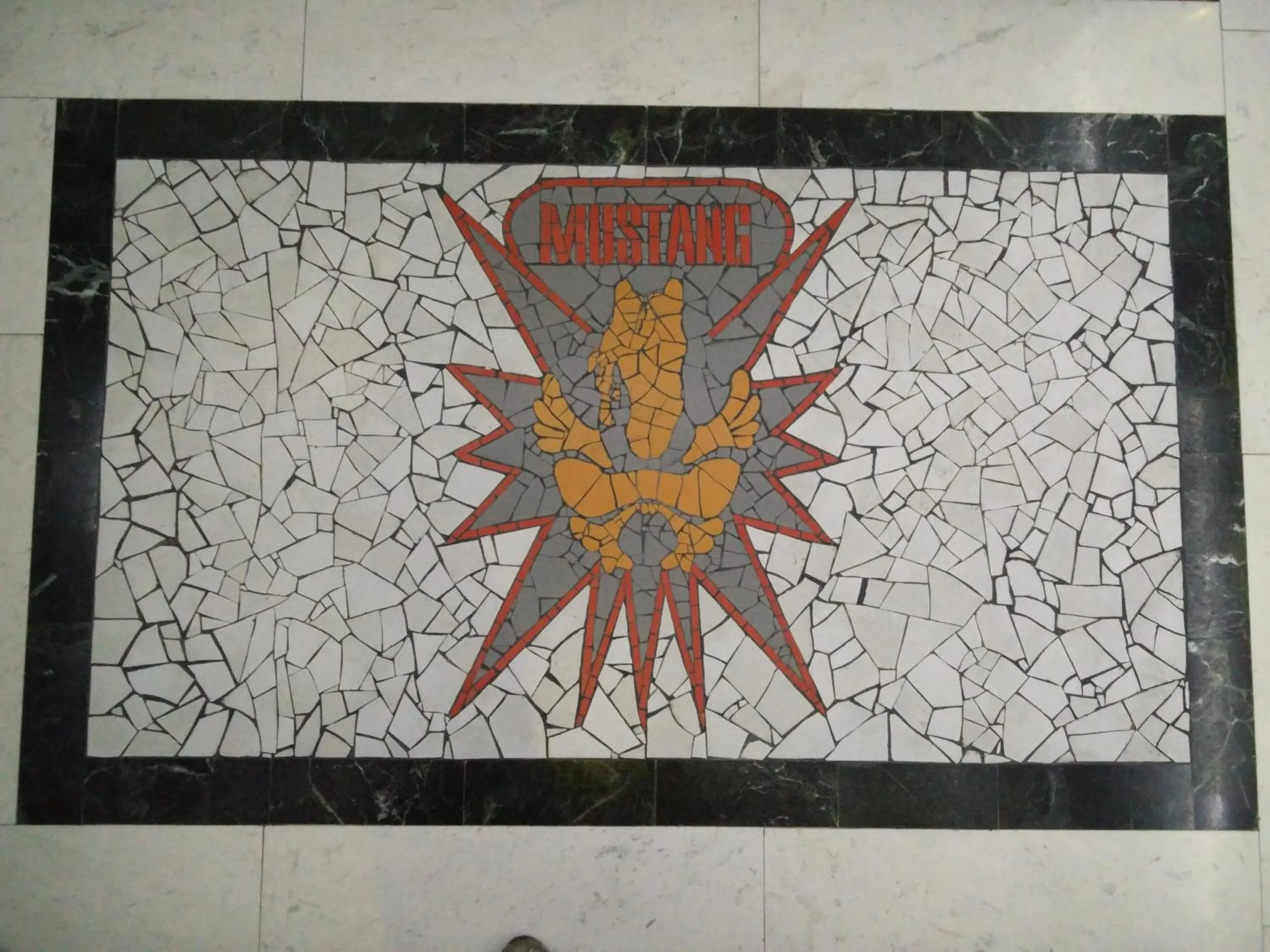 Property logo or sign in Hotel Mustang