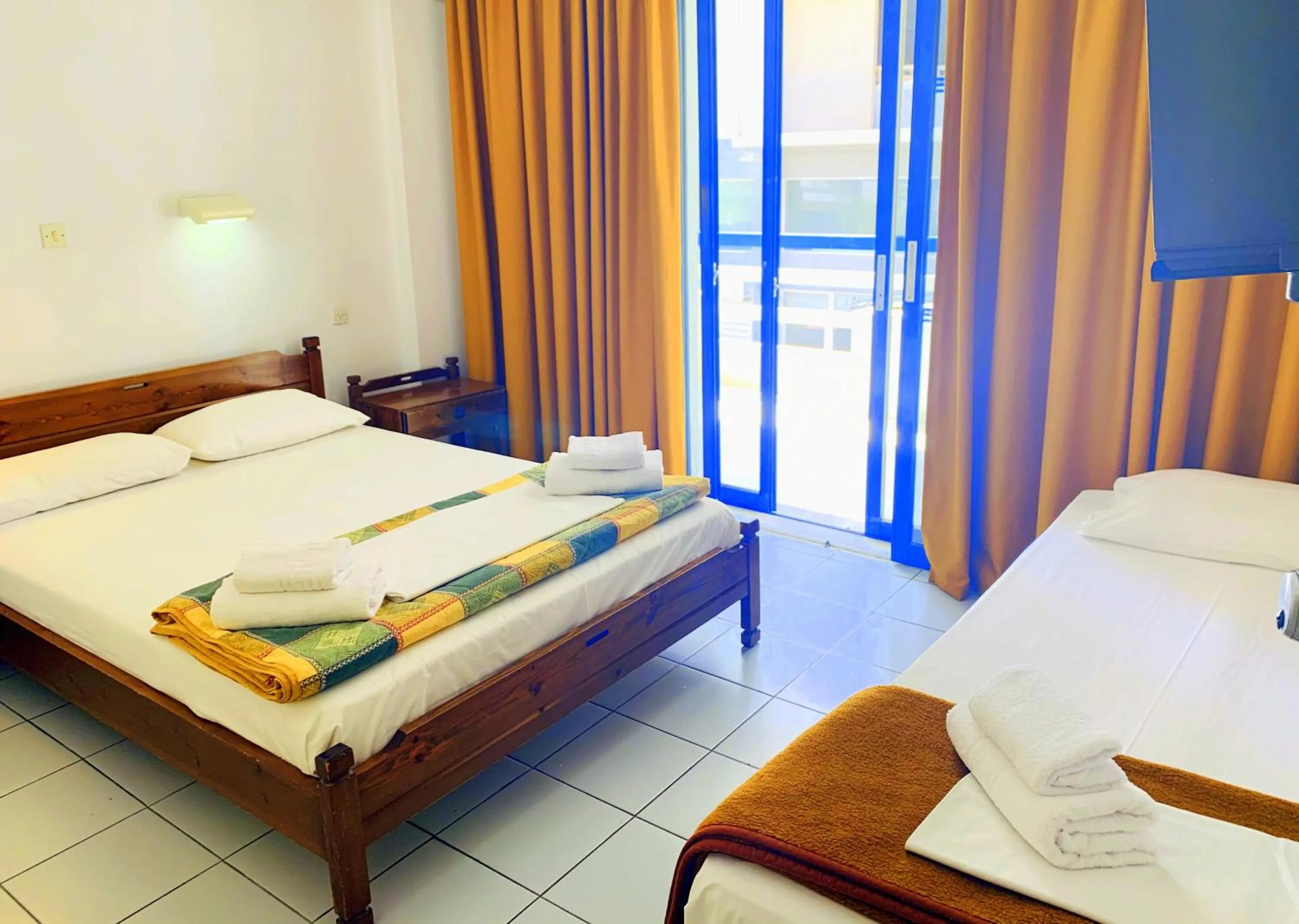 Bed in Kassavetis Center - Hotel Studios & Apartments