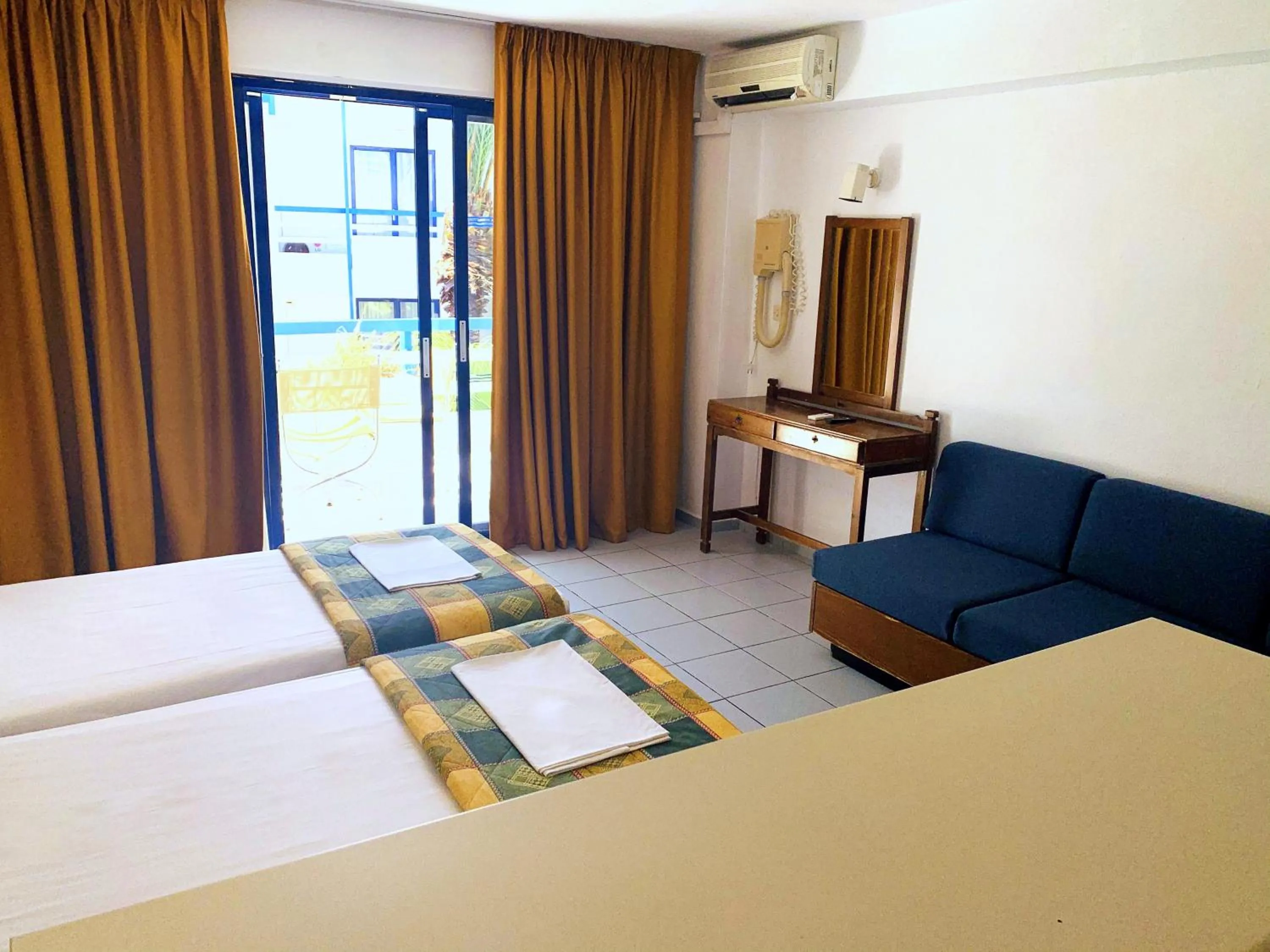 Bedroom, Bed in Kassavetis Center - Hotel Studios & Apartments