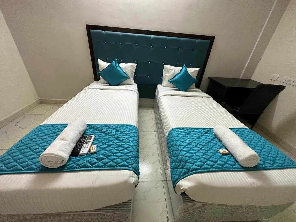 Bed in Hotel Skymoon Luxury Rooms