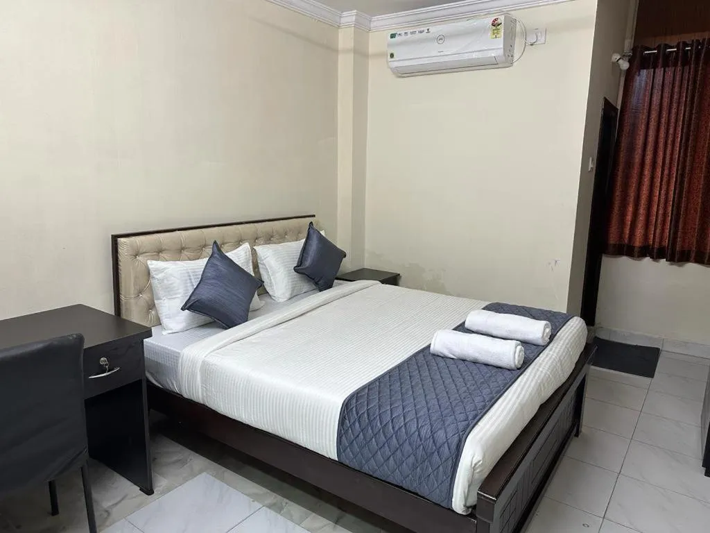 Bed in Hotel Skymoon Luxury Rooms