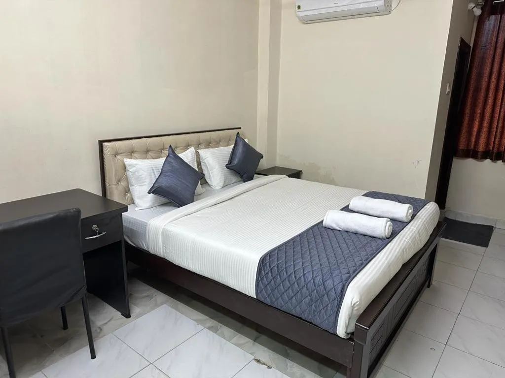 Bed in Hotel Skymoon Luxury Rooms