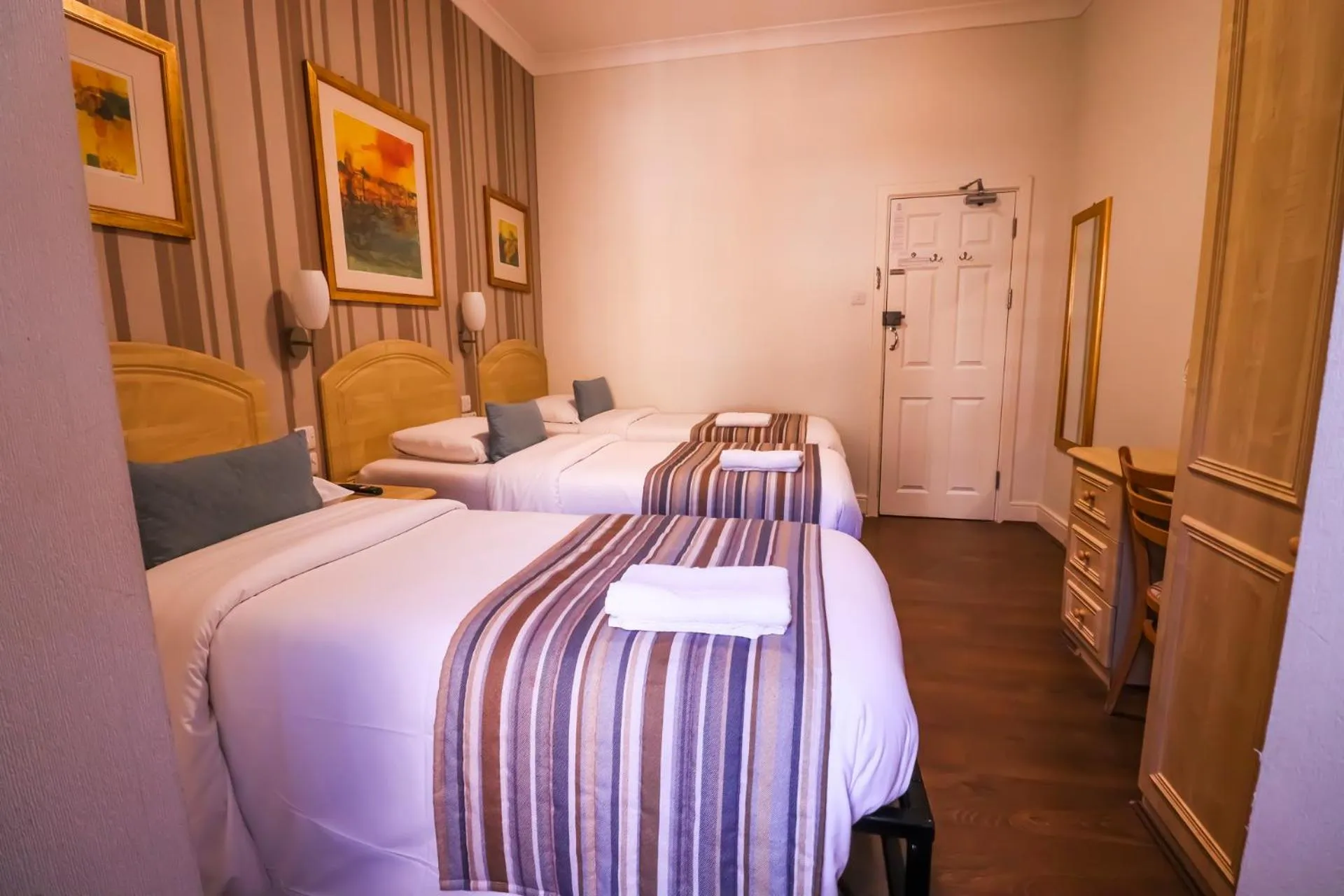 Bed in Fairway Hotel