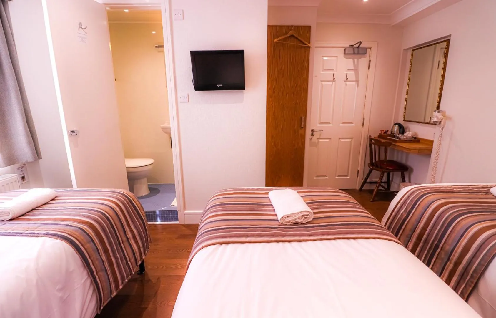 Bed in Fairway Hotel