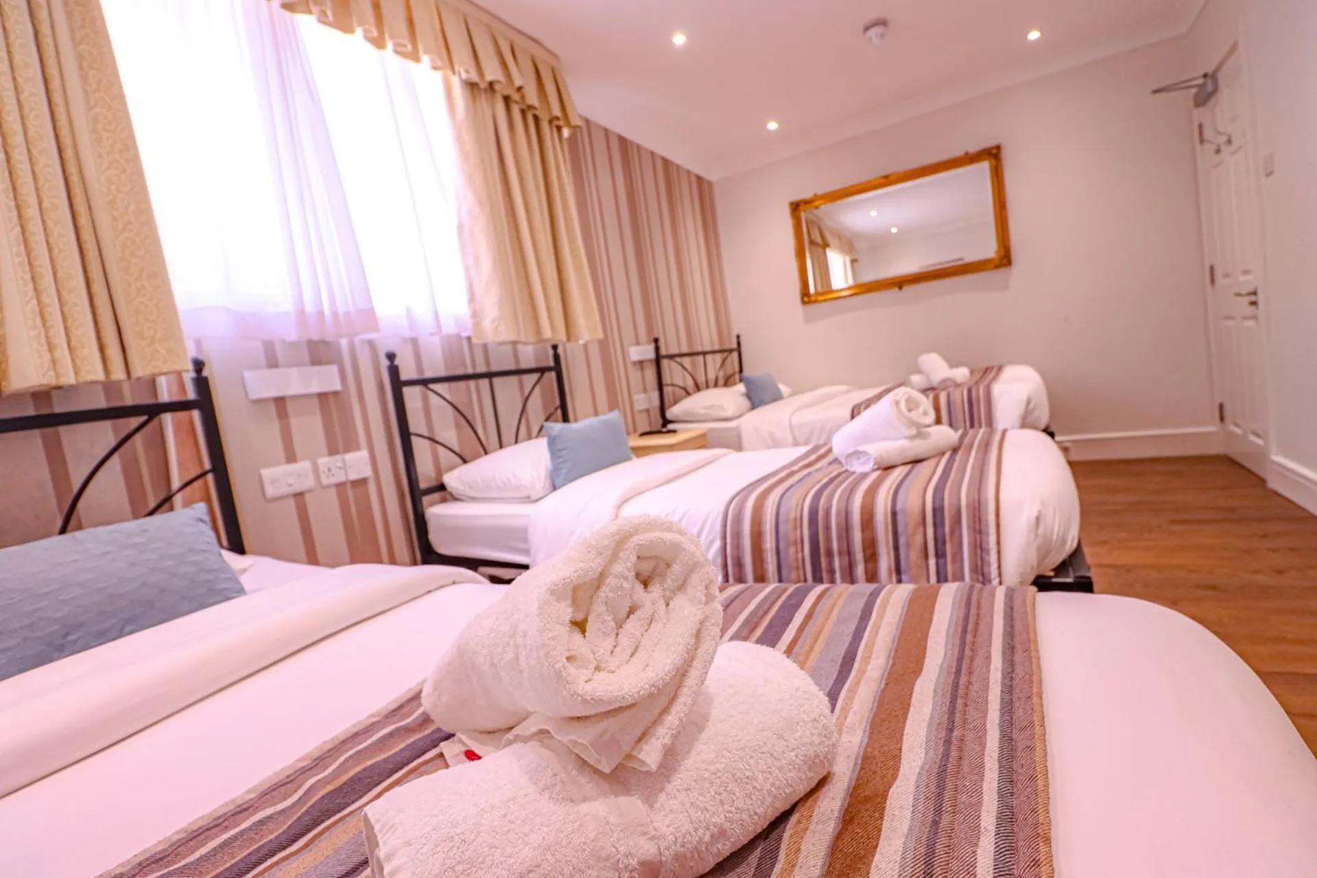 Bed in Fairway Hotel