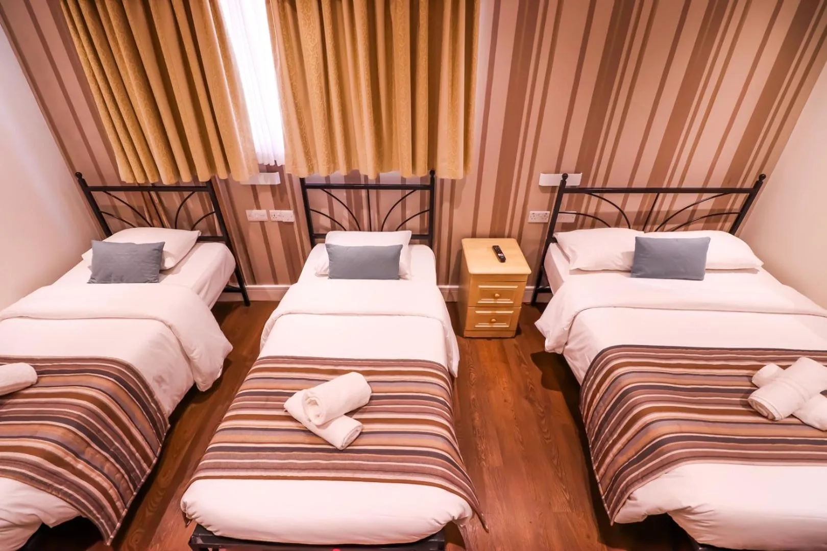 Bed in Fairway Hotel