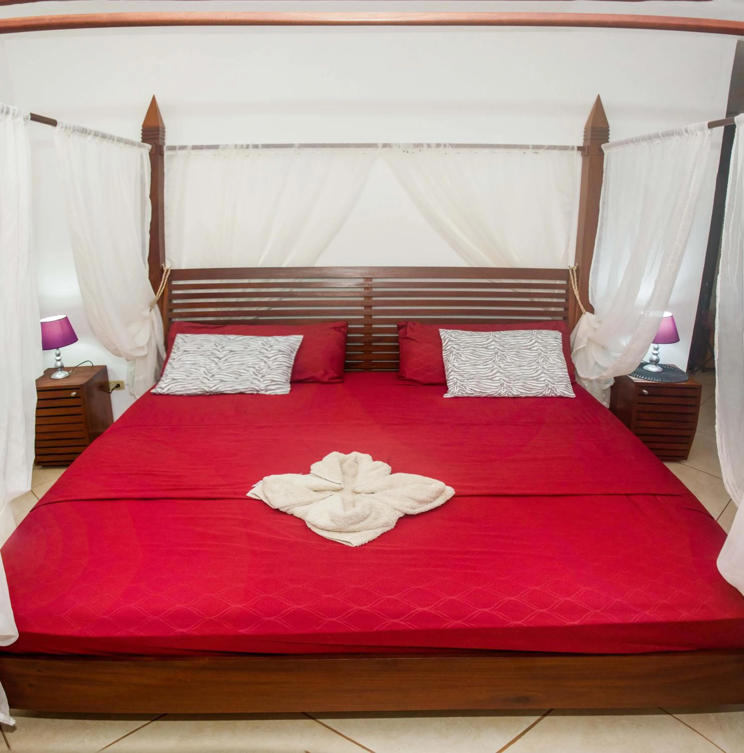 Bed in Punta Duarte Garden Inn