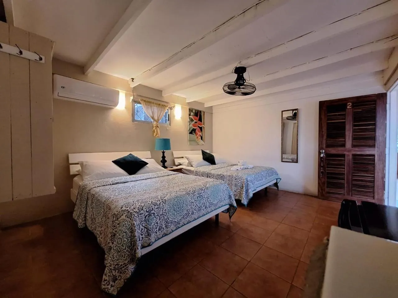 Bed in Hotel M&M Beach House