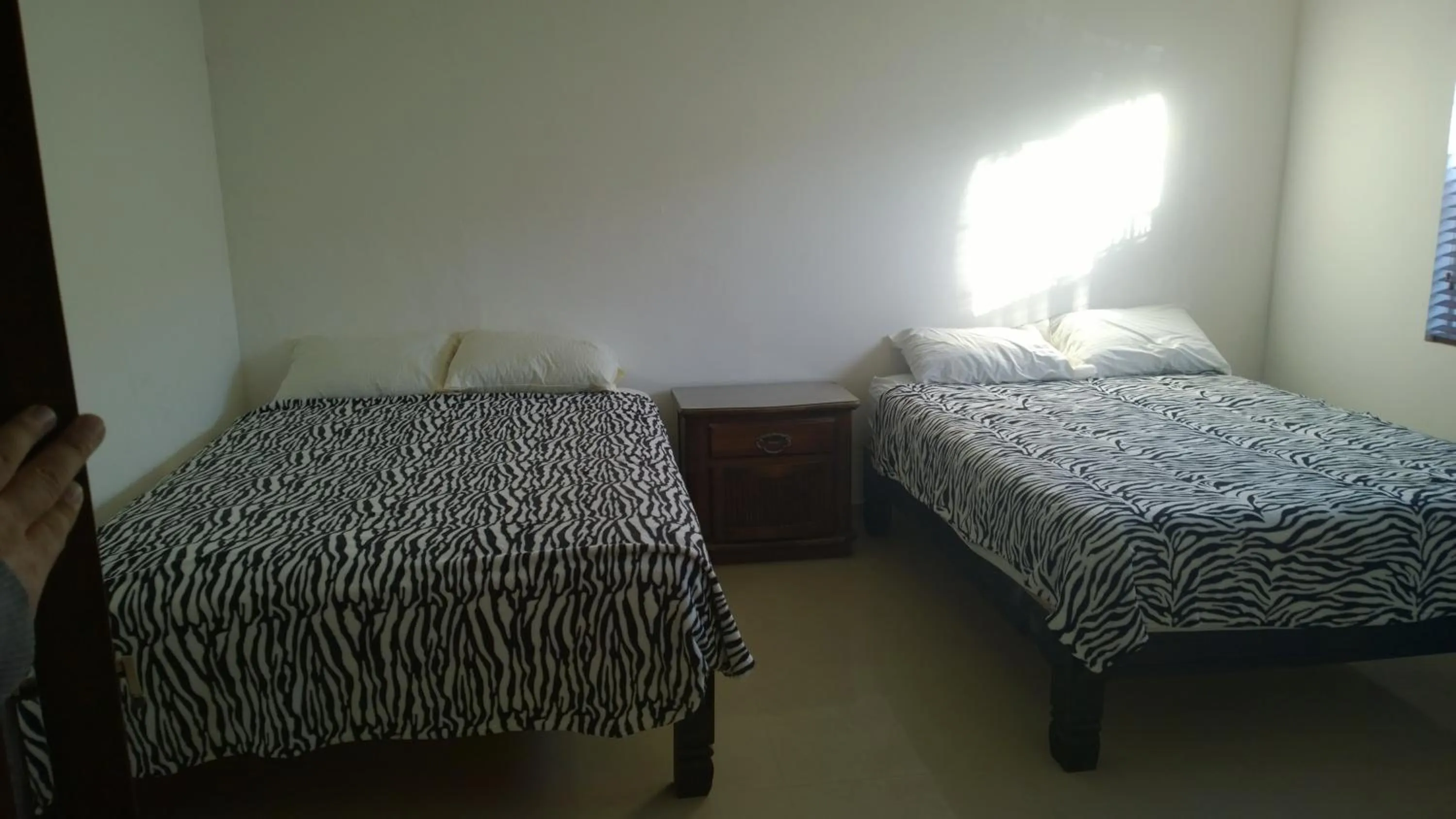 Bed in Hotel Bugambilias