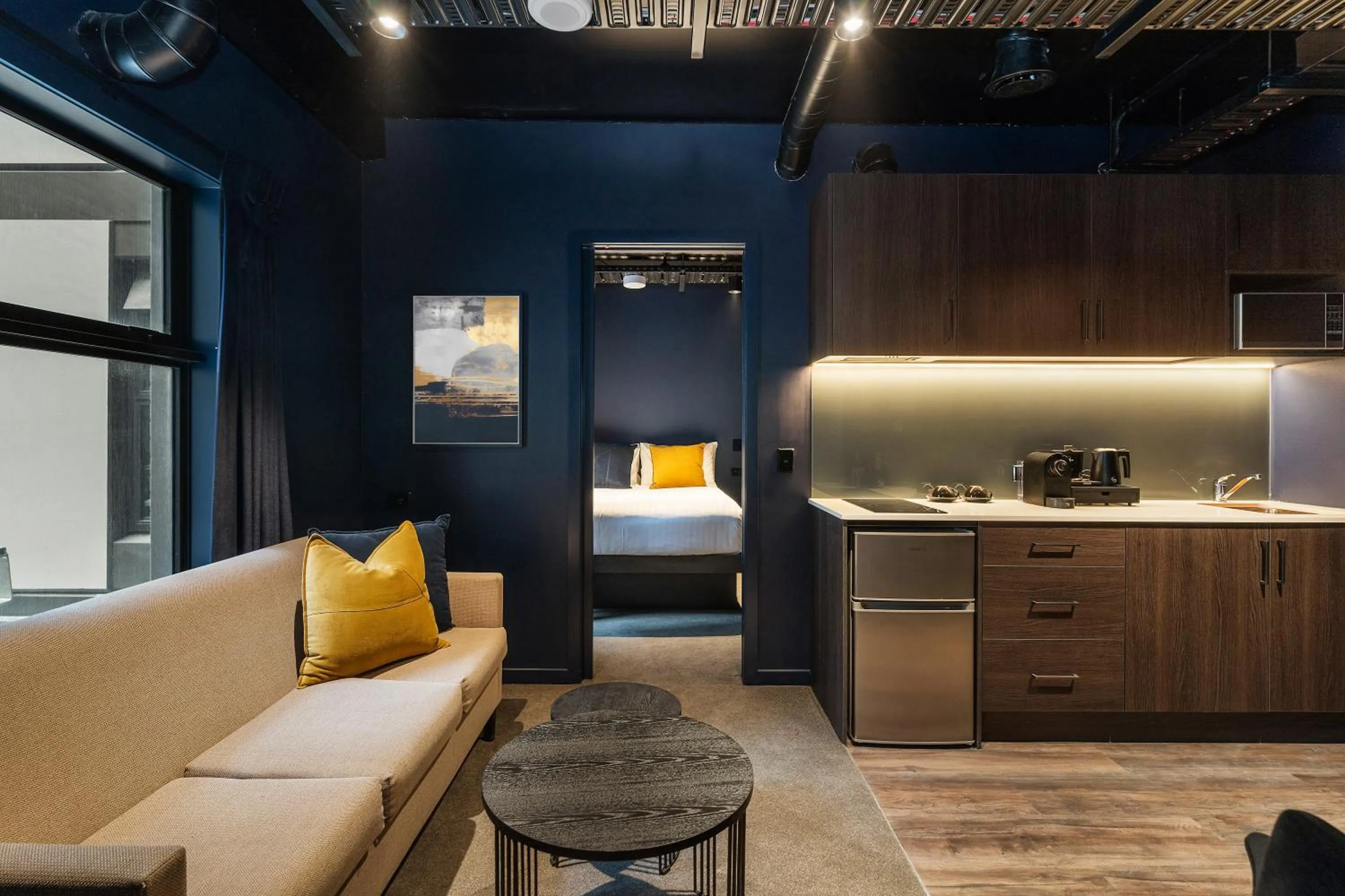 Living room, Bed in Abstract Hotel