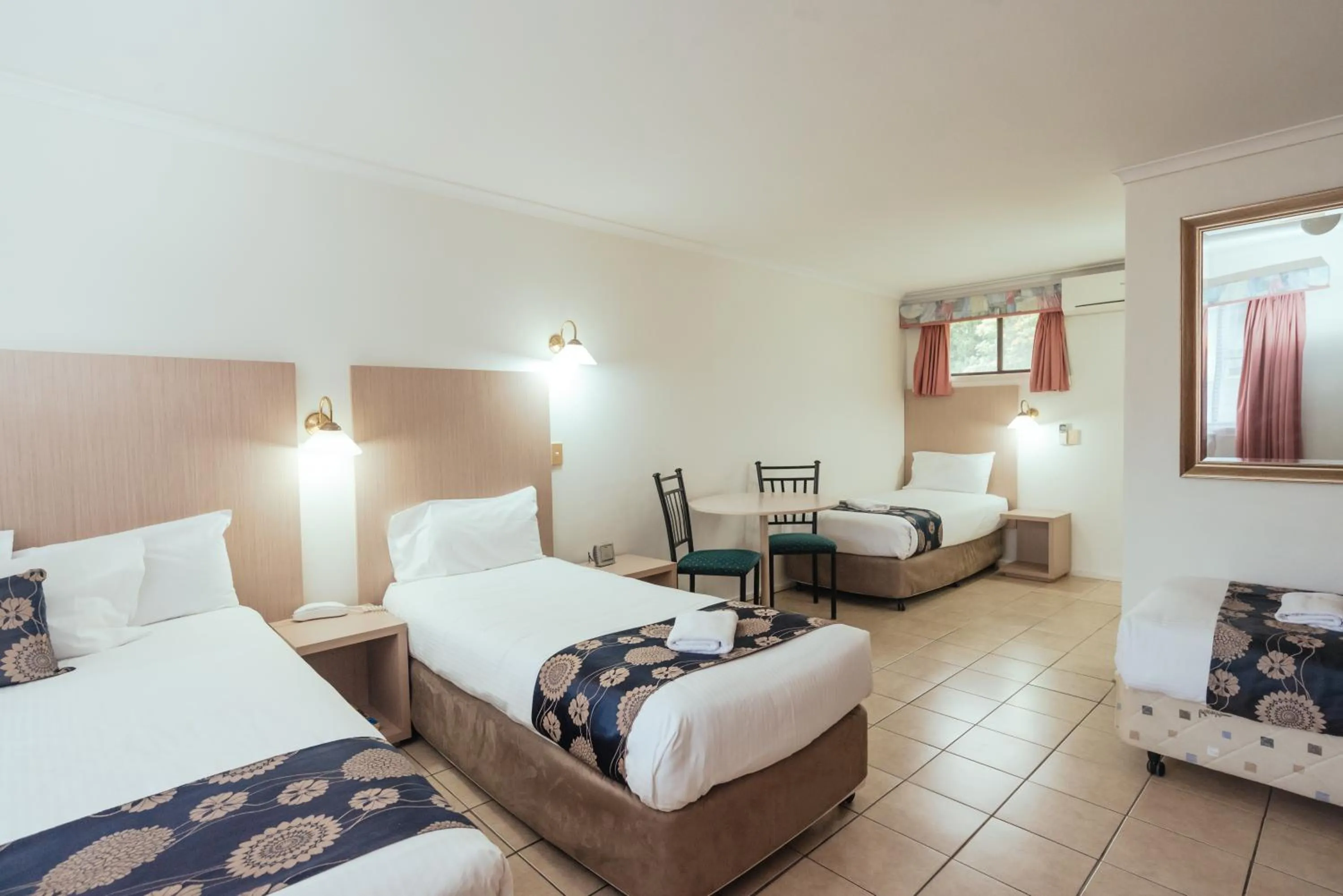 Bed in Coffs Windmill Motel