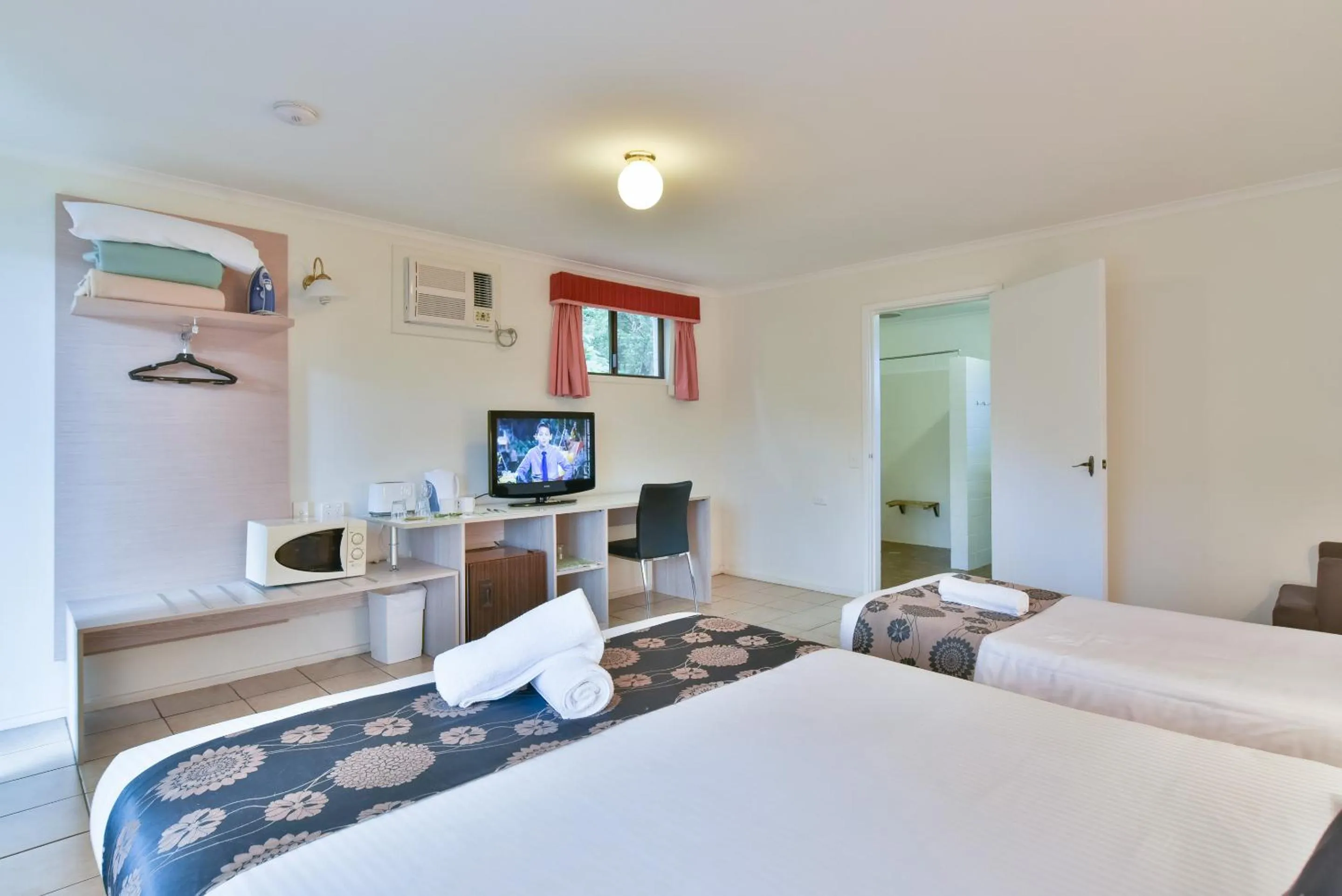 Bed in Coffs Windmill Motel