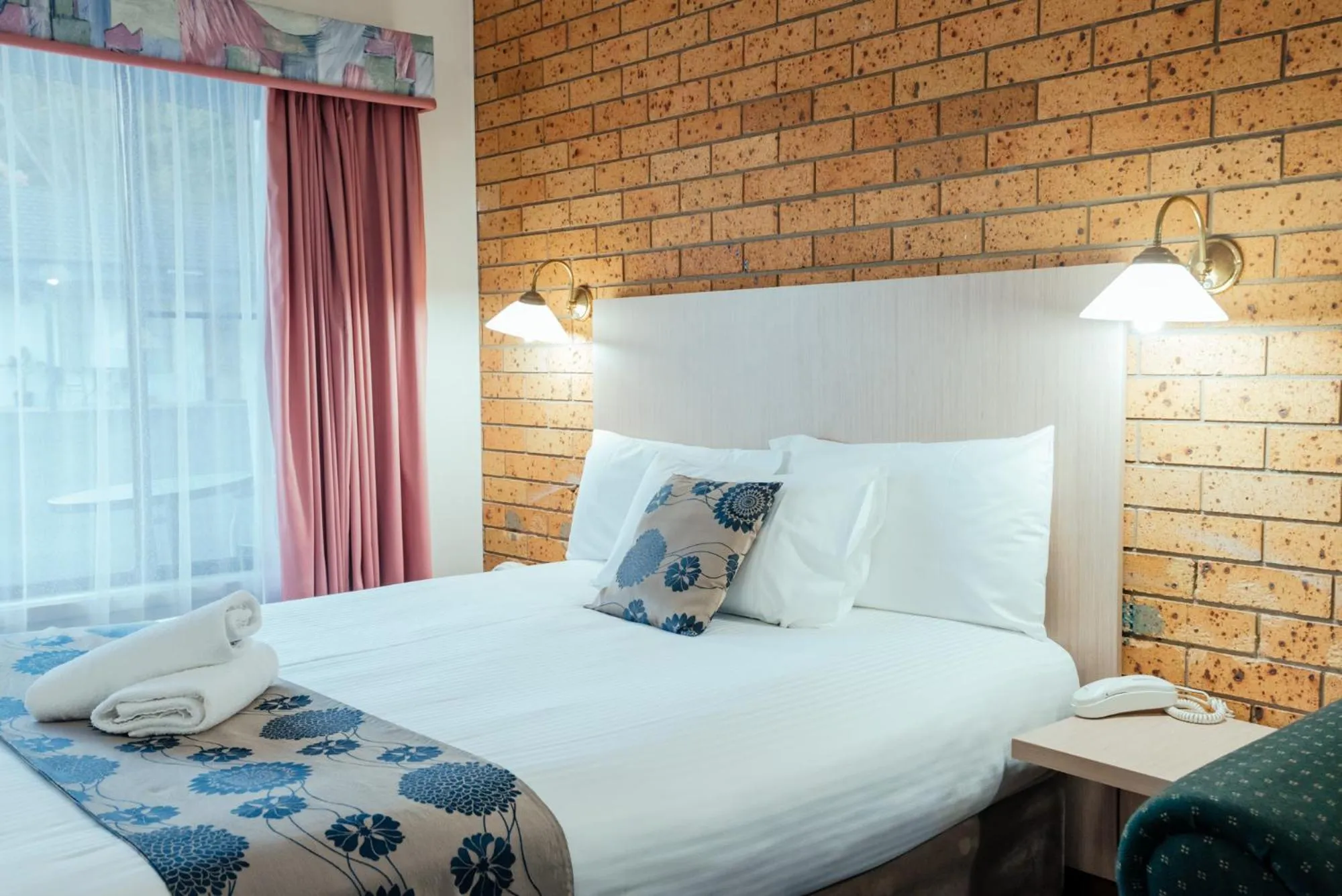 Bed in Coffs Windmill Motel