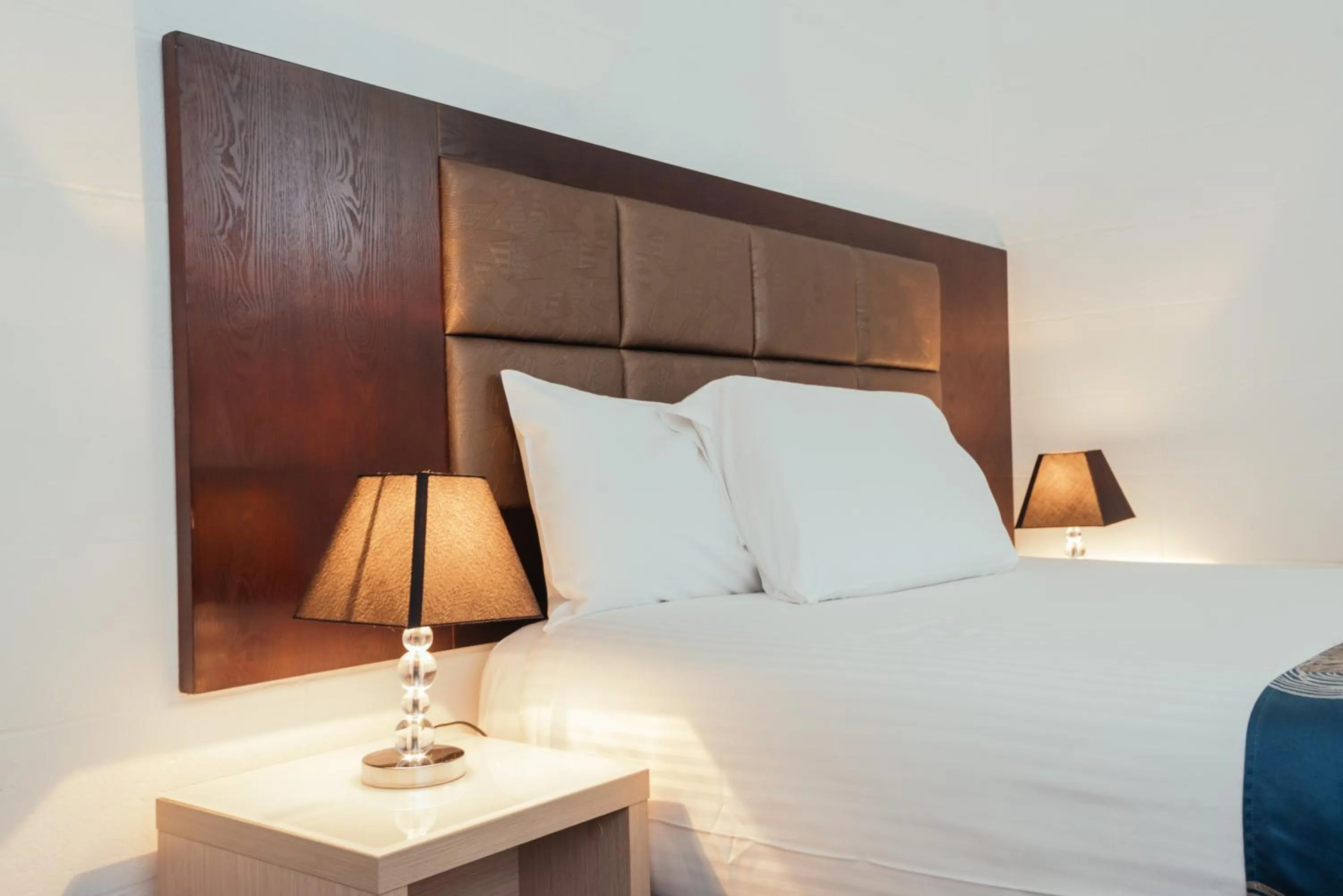 Bed in Coffs Windmill Motel