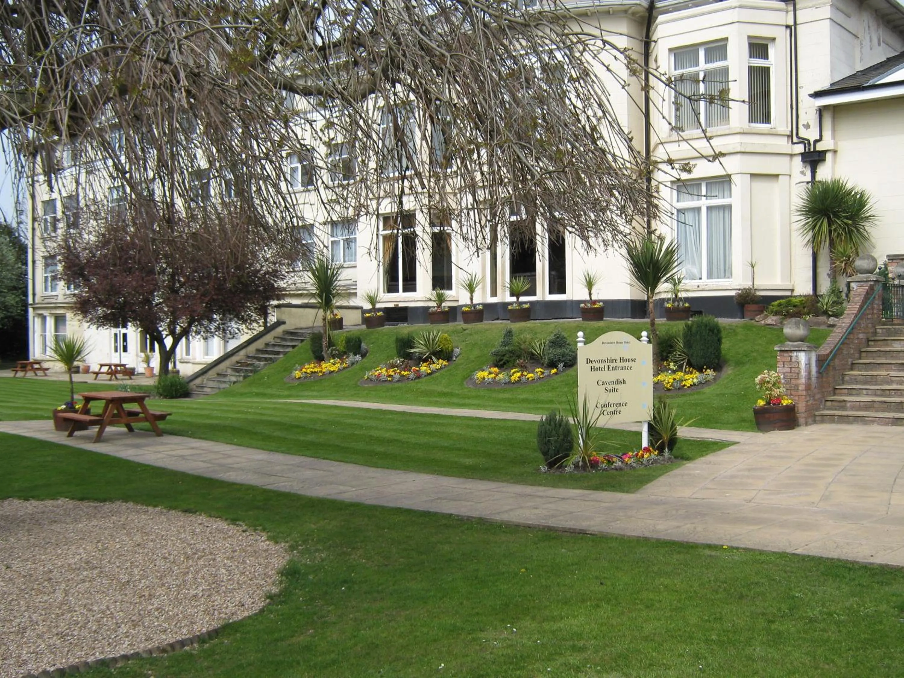 Facade/entrance, Garden in The Devonshire House Hotel