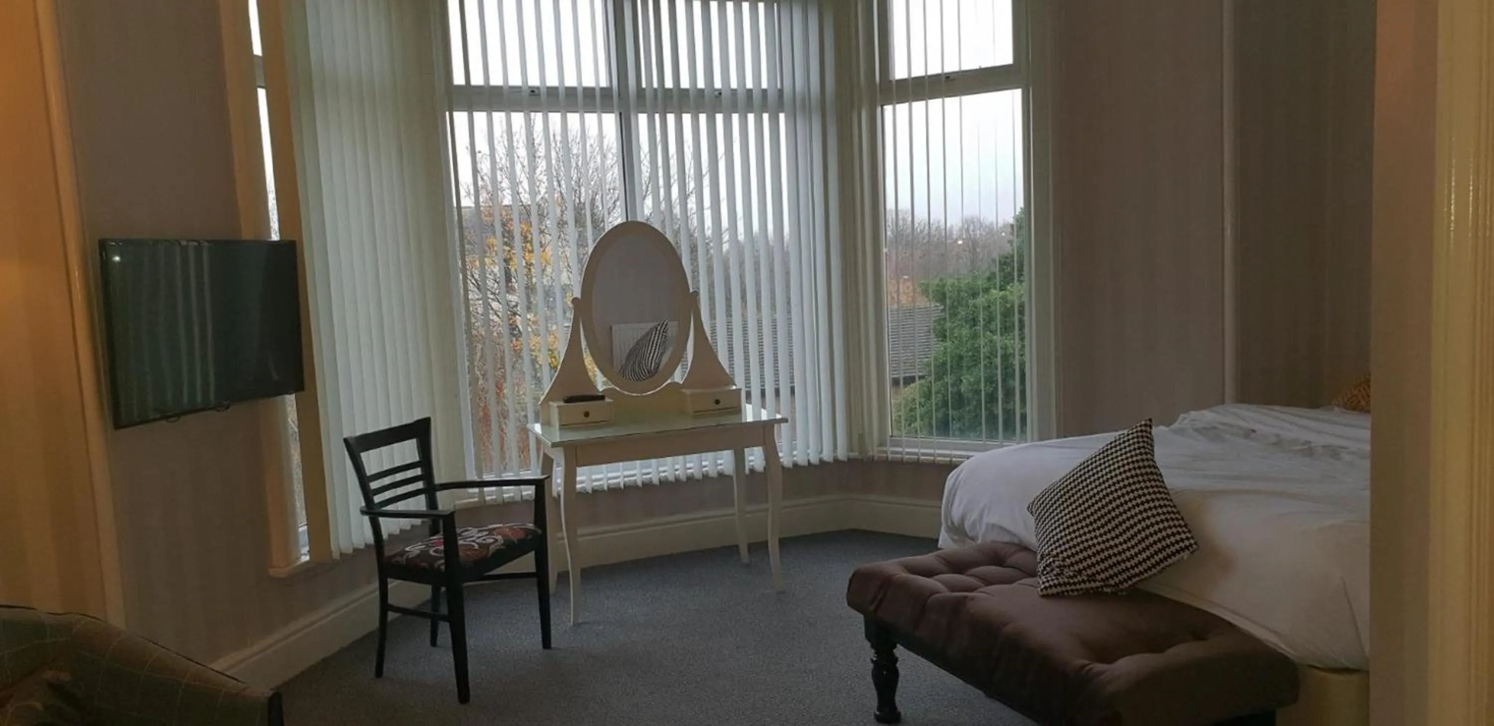 Bedroom, Seating Area in The Devonshire House Hotel