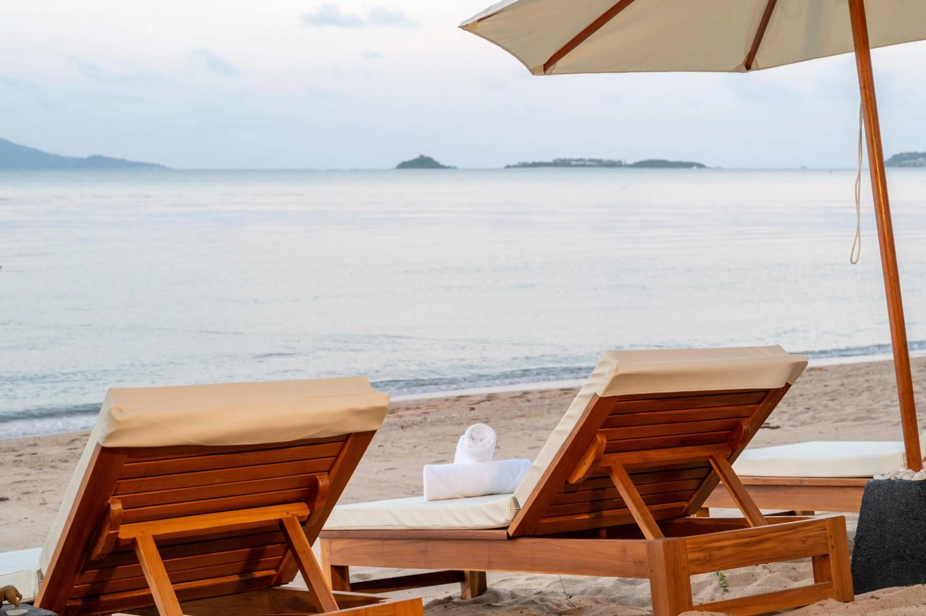 Beach in Baan Bophut Beach Hotel Samui - SHA Extra Plus