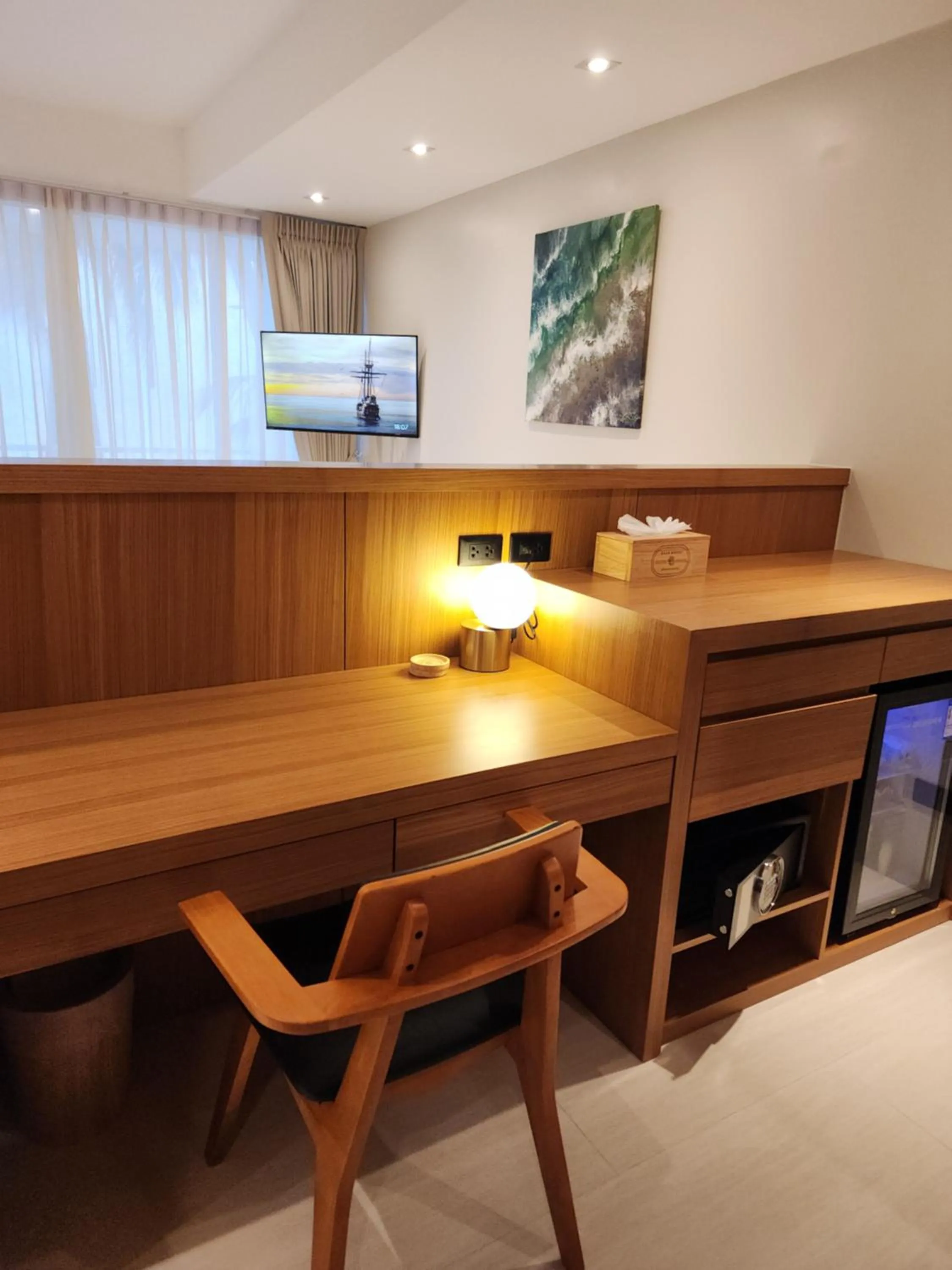 TV and multimedia in Baan Bophut Beach Hotel Samui - SHA Extra Plus