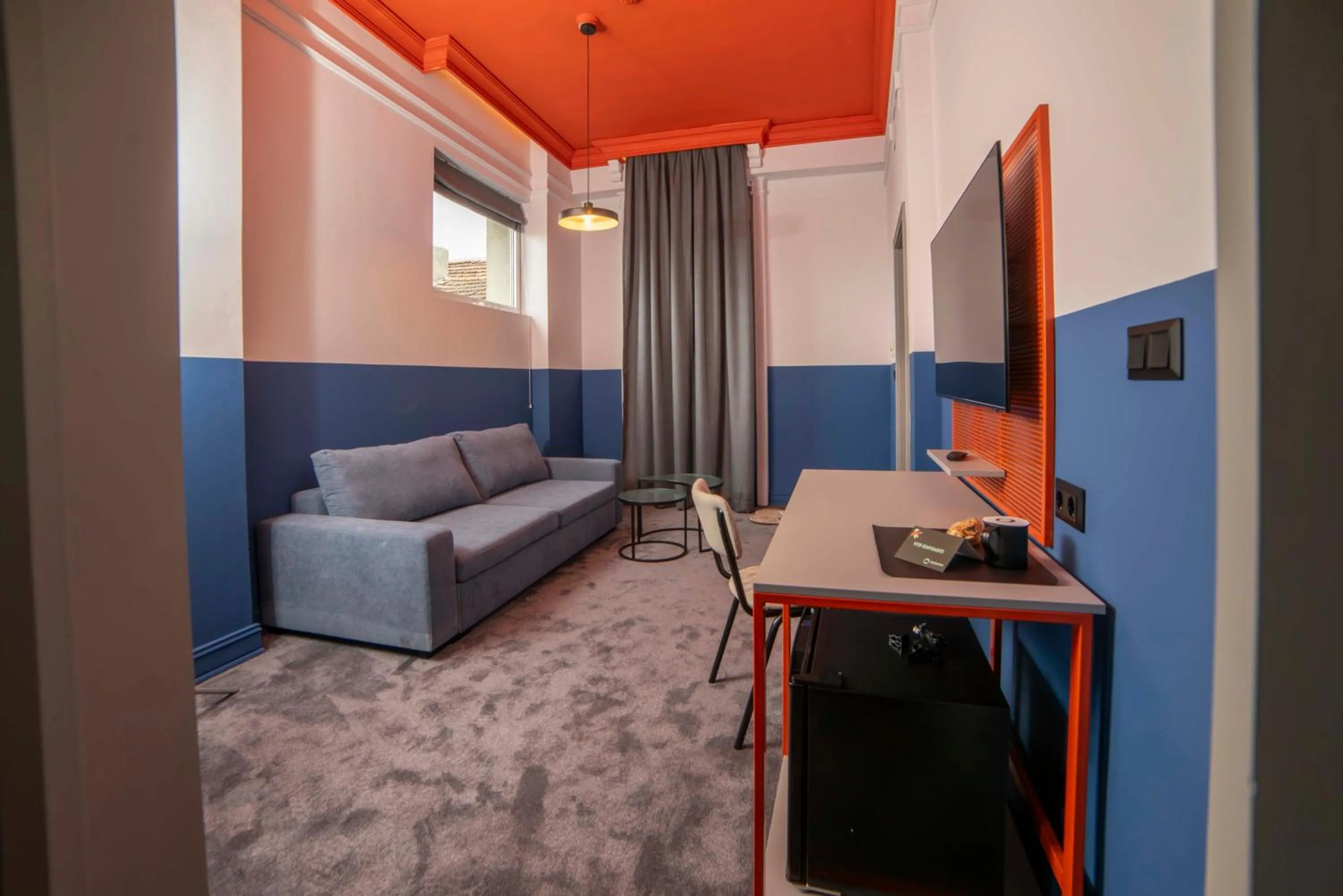 Living room in Maria Luisa by INTROVERT HOTELS