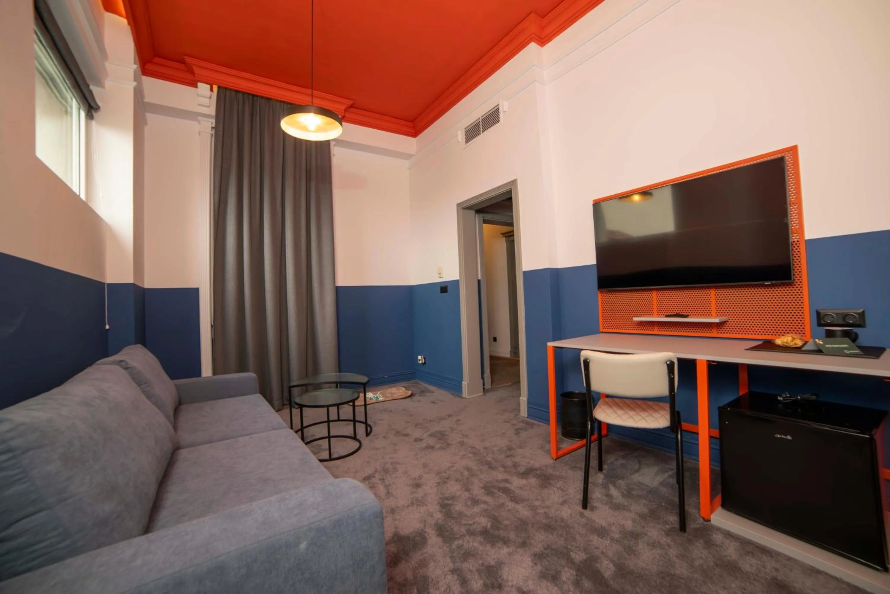 Living room in Maria Luisa by INTROVERT HOTELS