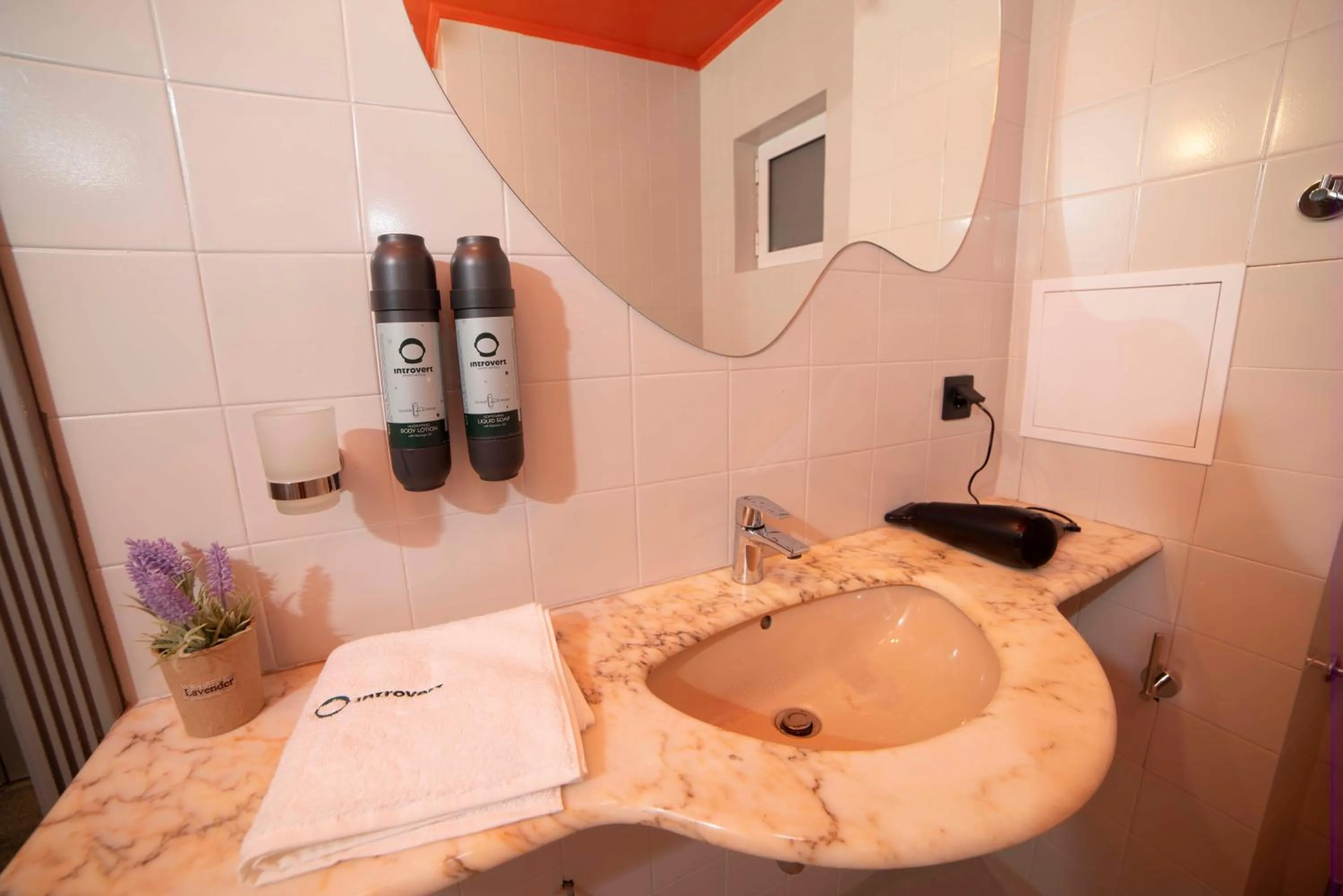 Bathroom in Maria Luisa by INTROVERT HOTELS