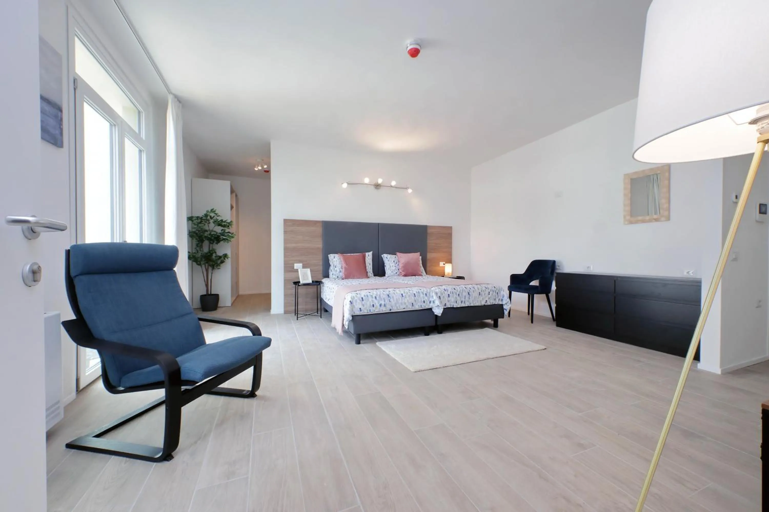 Photo of the whole room, Bed in Siena Hills Apartments