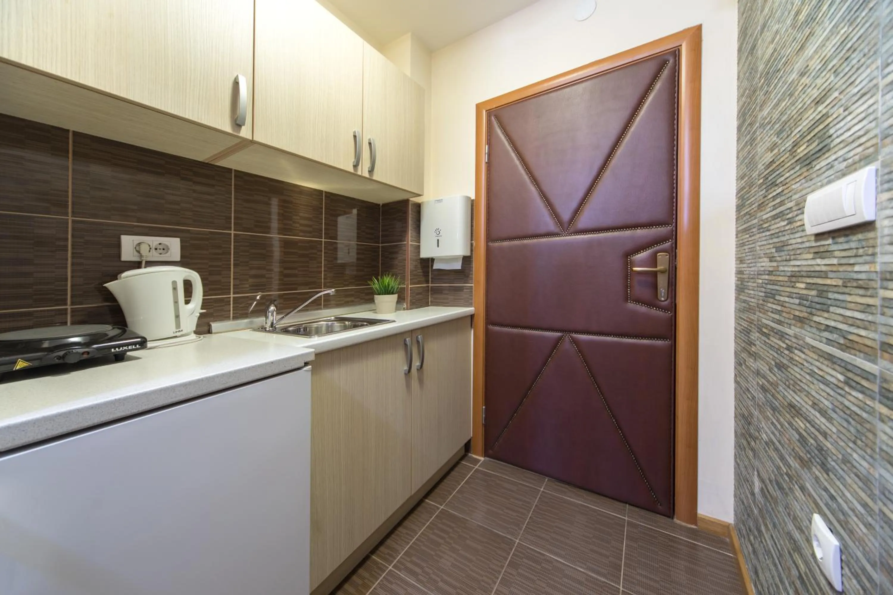 Kitchen or kitchenette in F Apartmani Kragujevac