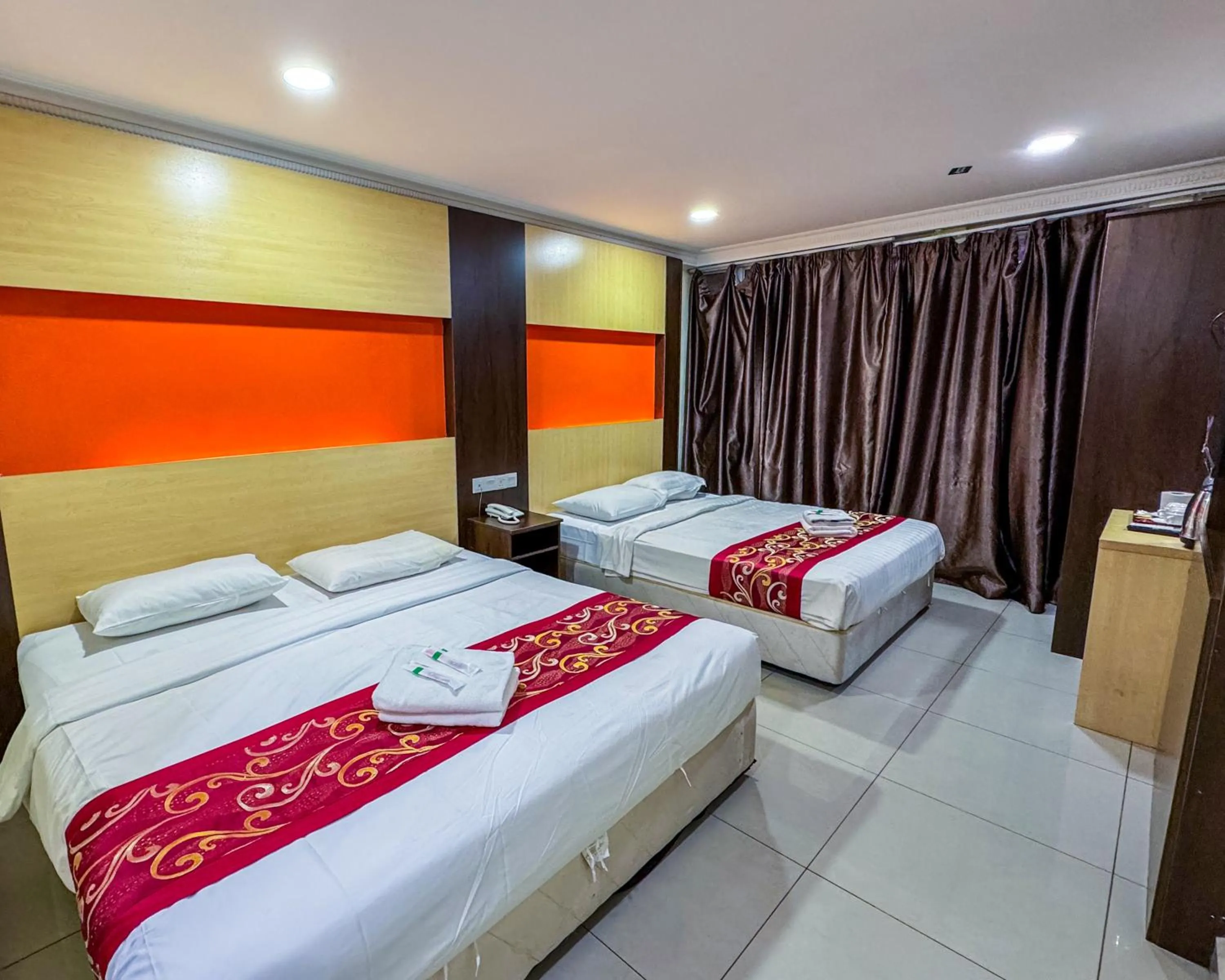 Bed in THE STARION HOTEL BUKIT BINTANG