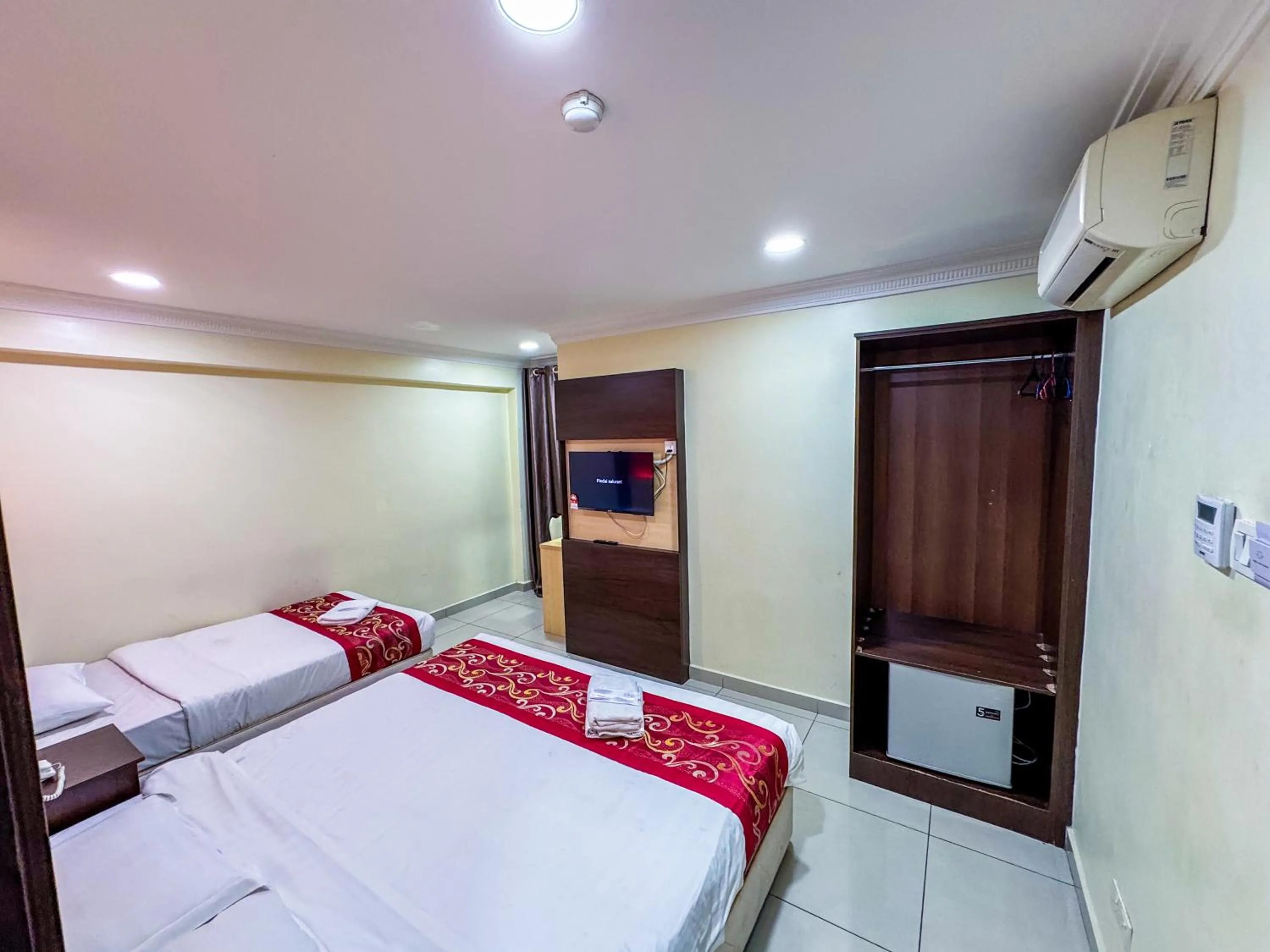 Bed in THE STARION HOTEL BUKIT BINTANG