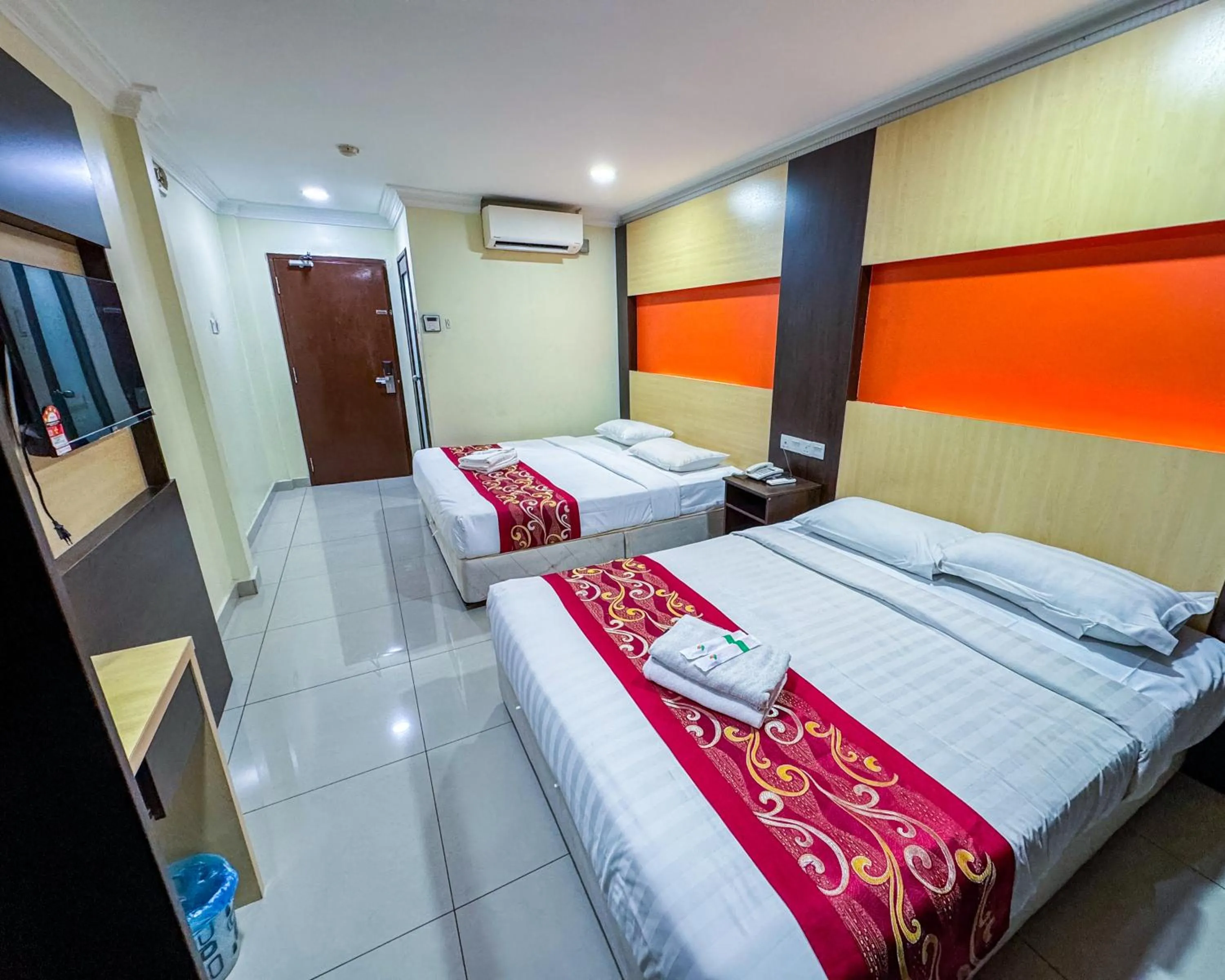 Bed in THE STARION HOTEL BUKIT BINTANG