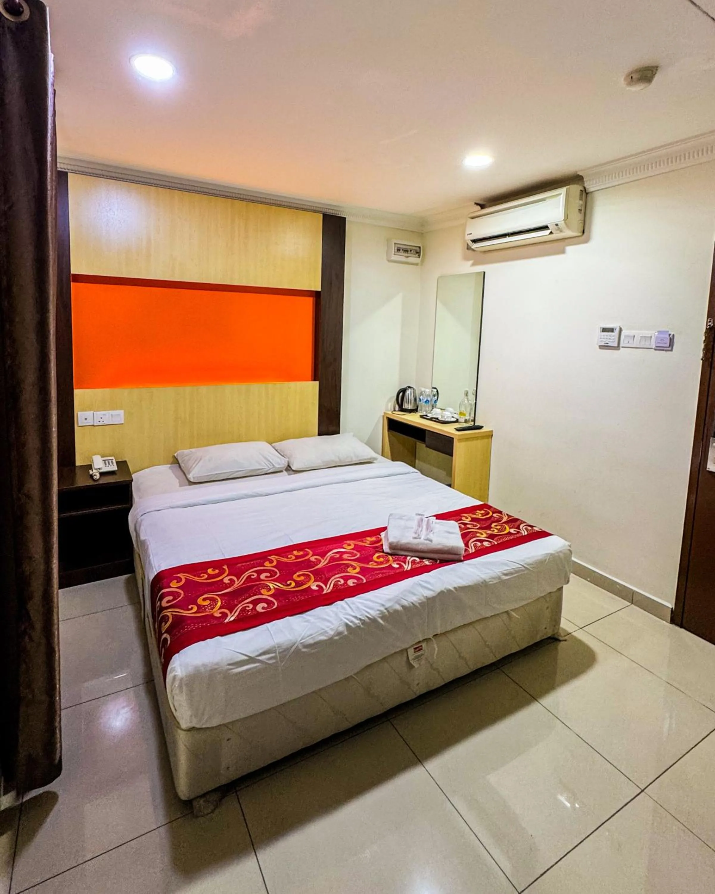 Bed in THE STARION HOTEL BUKIT BINTANG