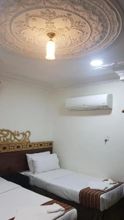 Bedroom in Al Tawfik Plaza