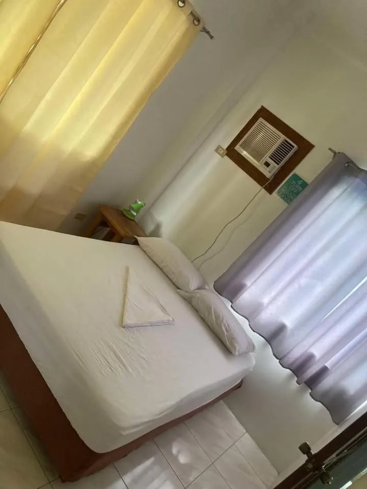 Bed in Baki Divers and Beach Resort