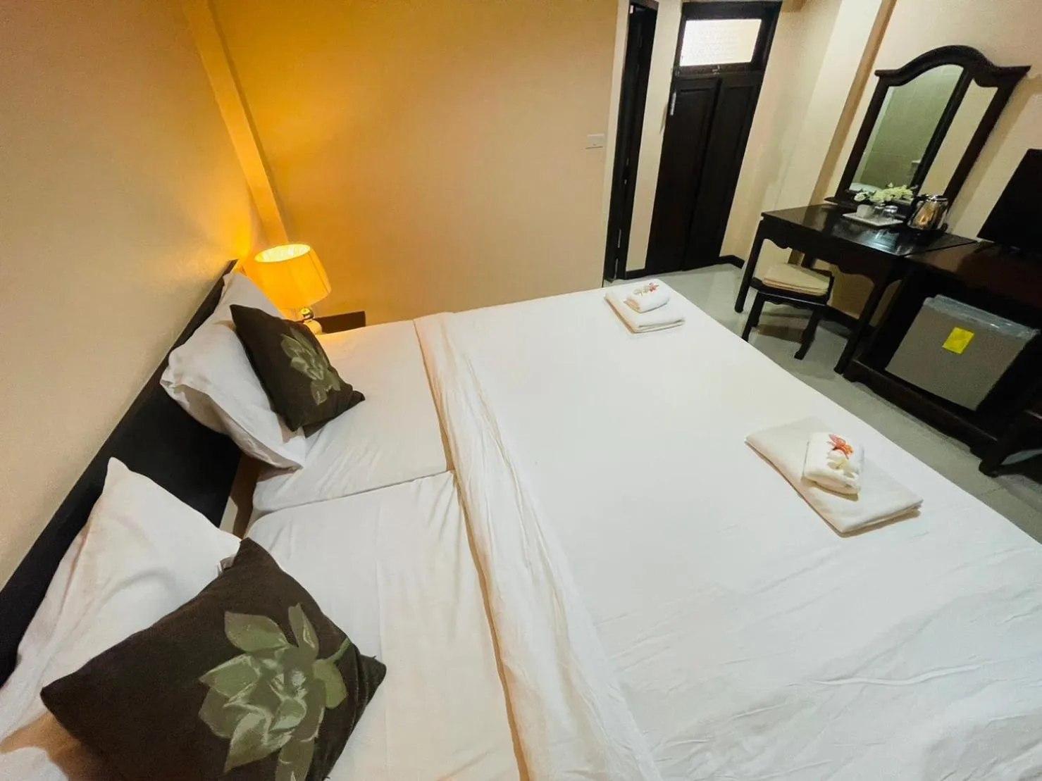 Bed in Na Thapae Chiangmai Hotel