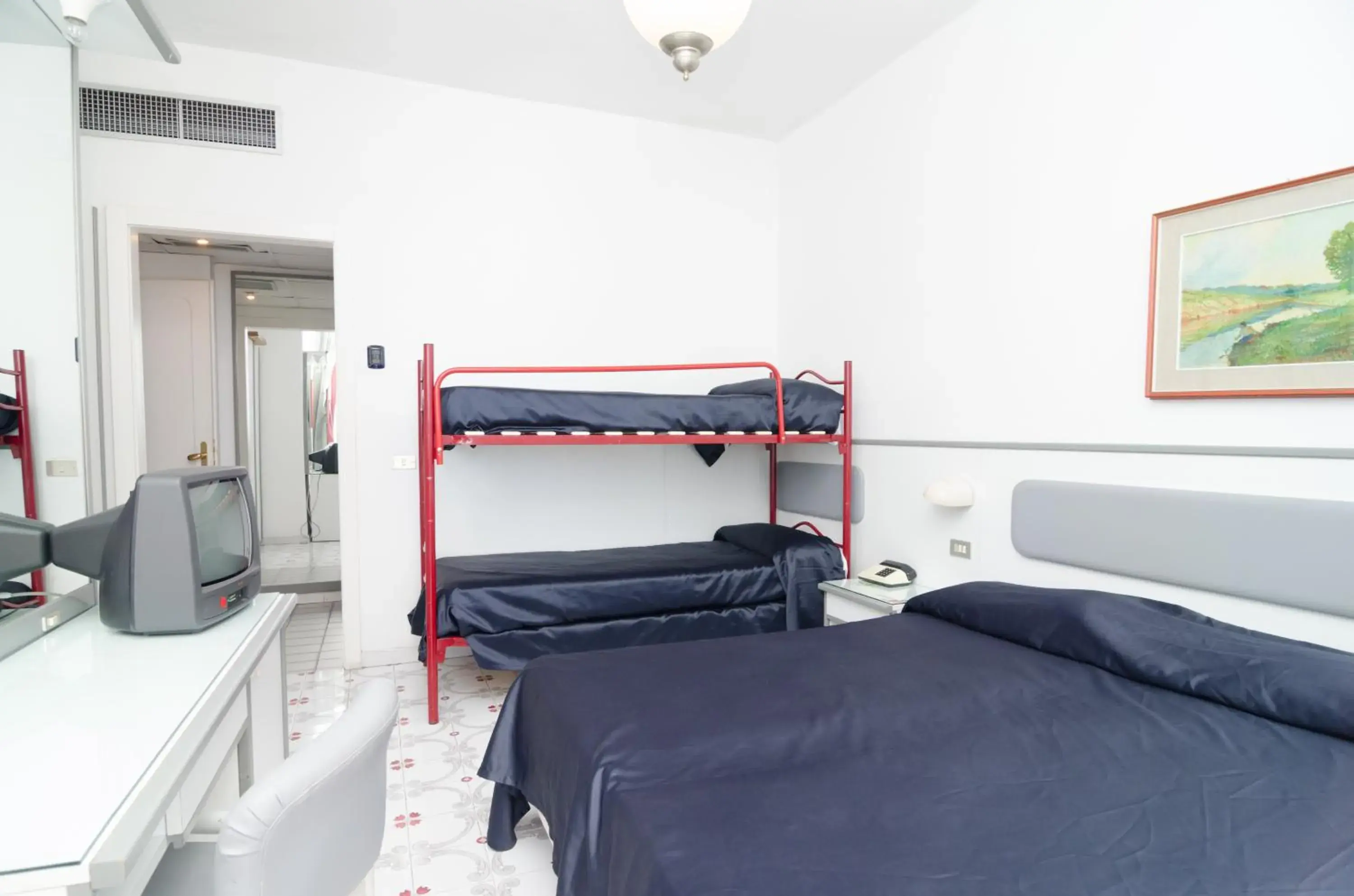 Quadruple Room in Hotel Flora Wellness & Beauty Quadruple Room in Hotel Flora Wellness & Beauty