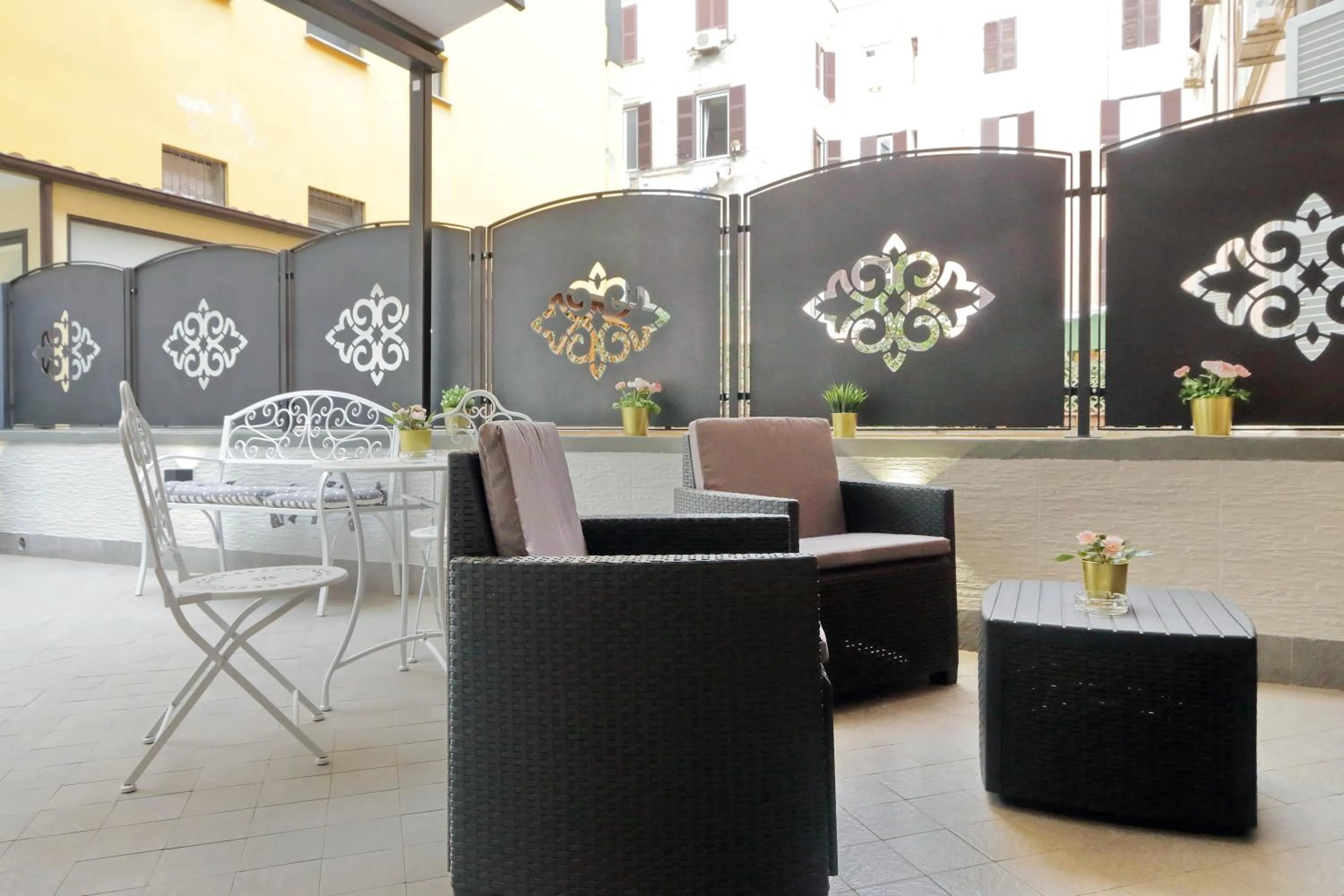 Patio in Roman Holiday Suites