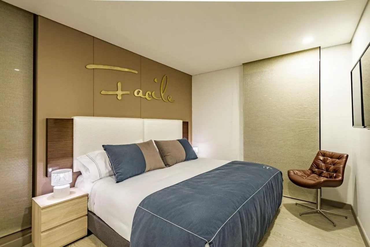 Bed in APARTAMENTOS FACILE