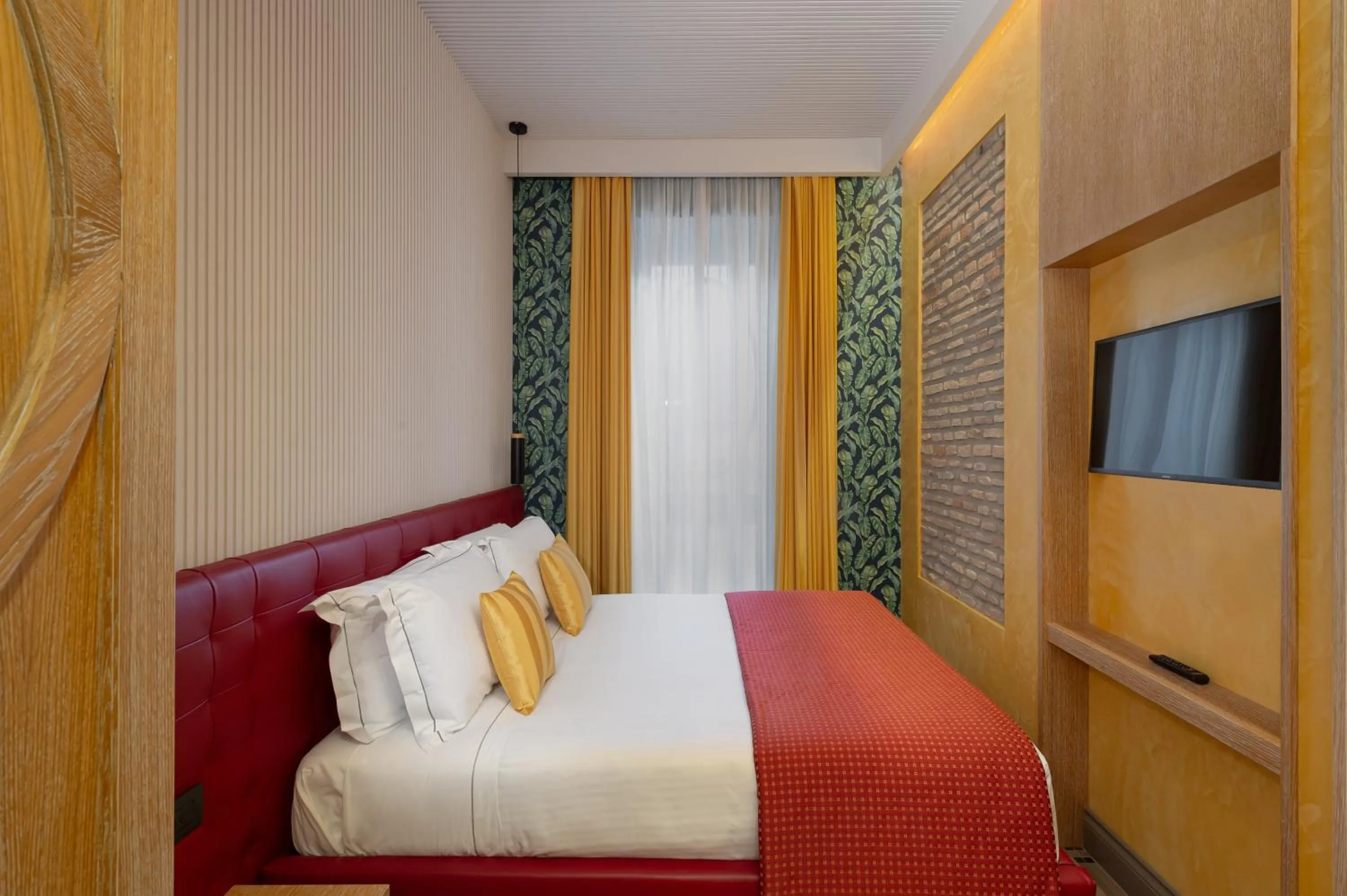 Bed in Passpartout Boutique Palace