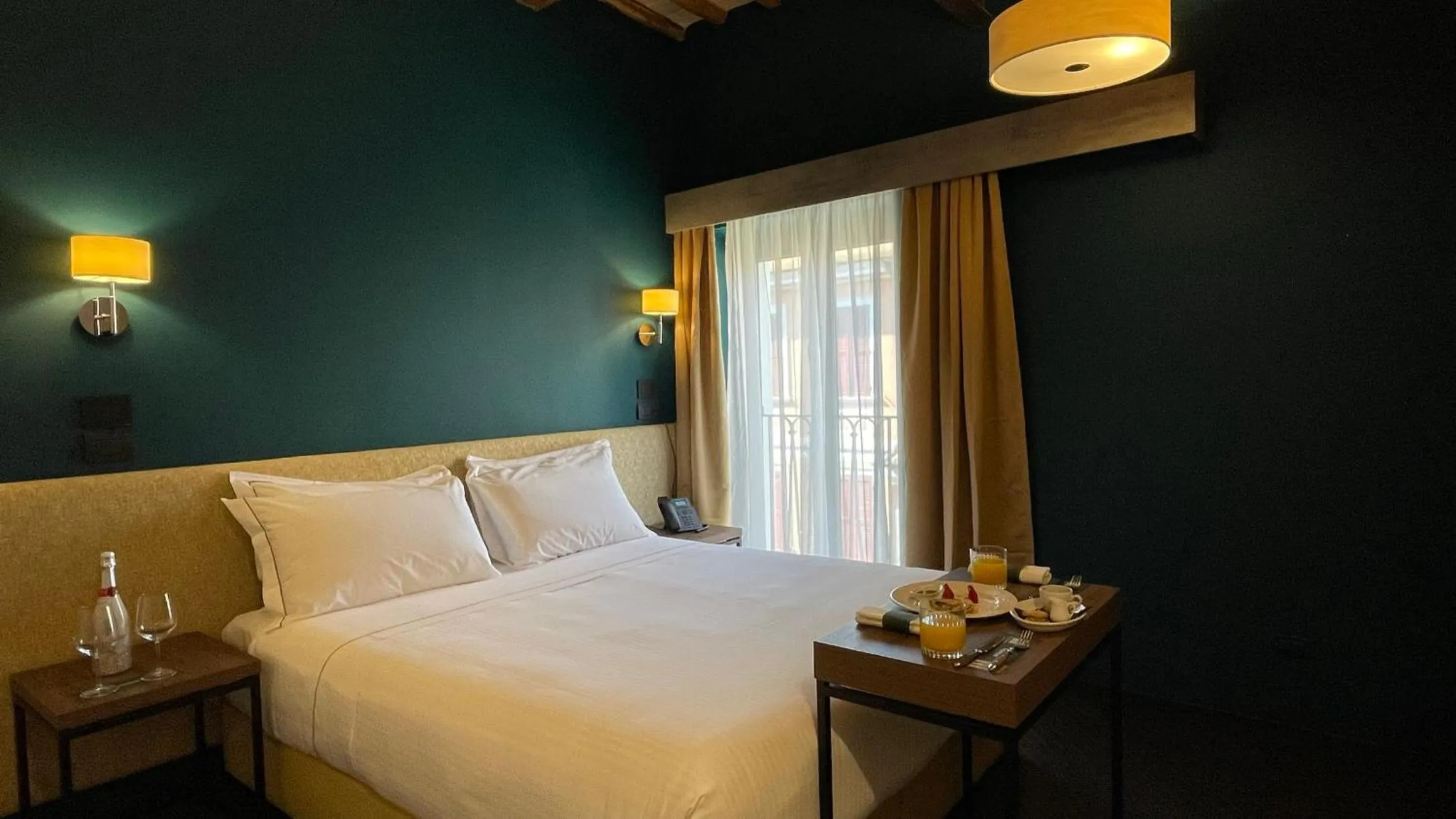 Bed in Passpartout Boutique Palace