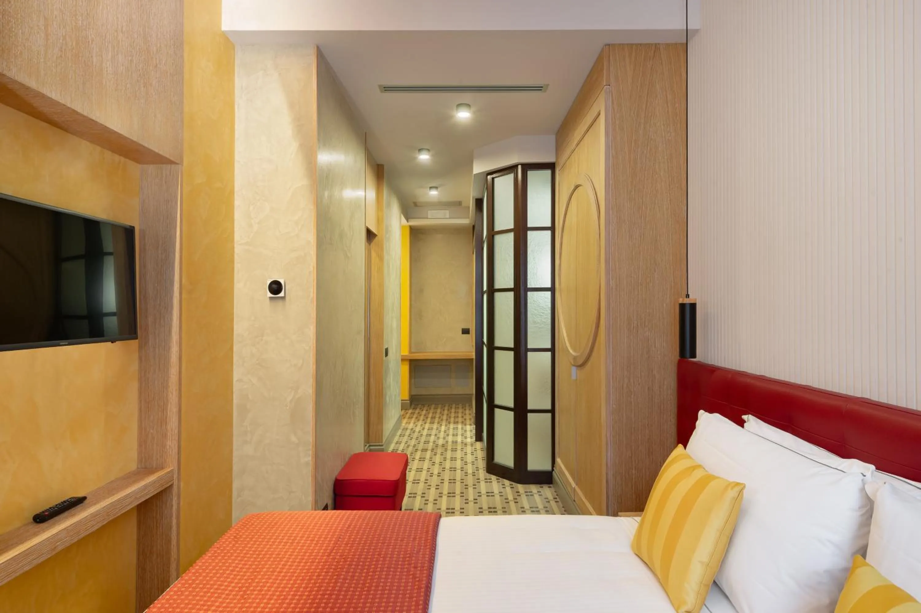 Bed in Passpartout Boutique Palace