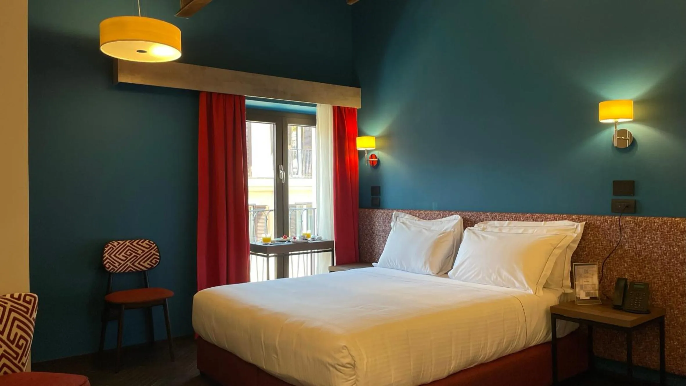 Bed in Passpartout Boutique Palace