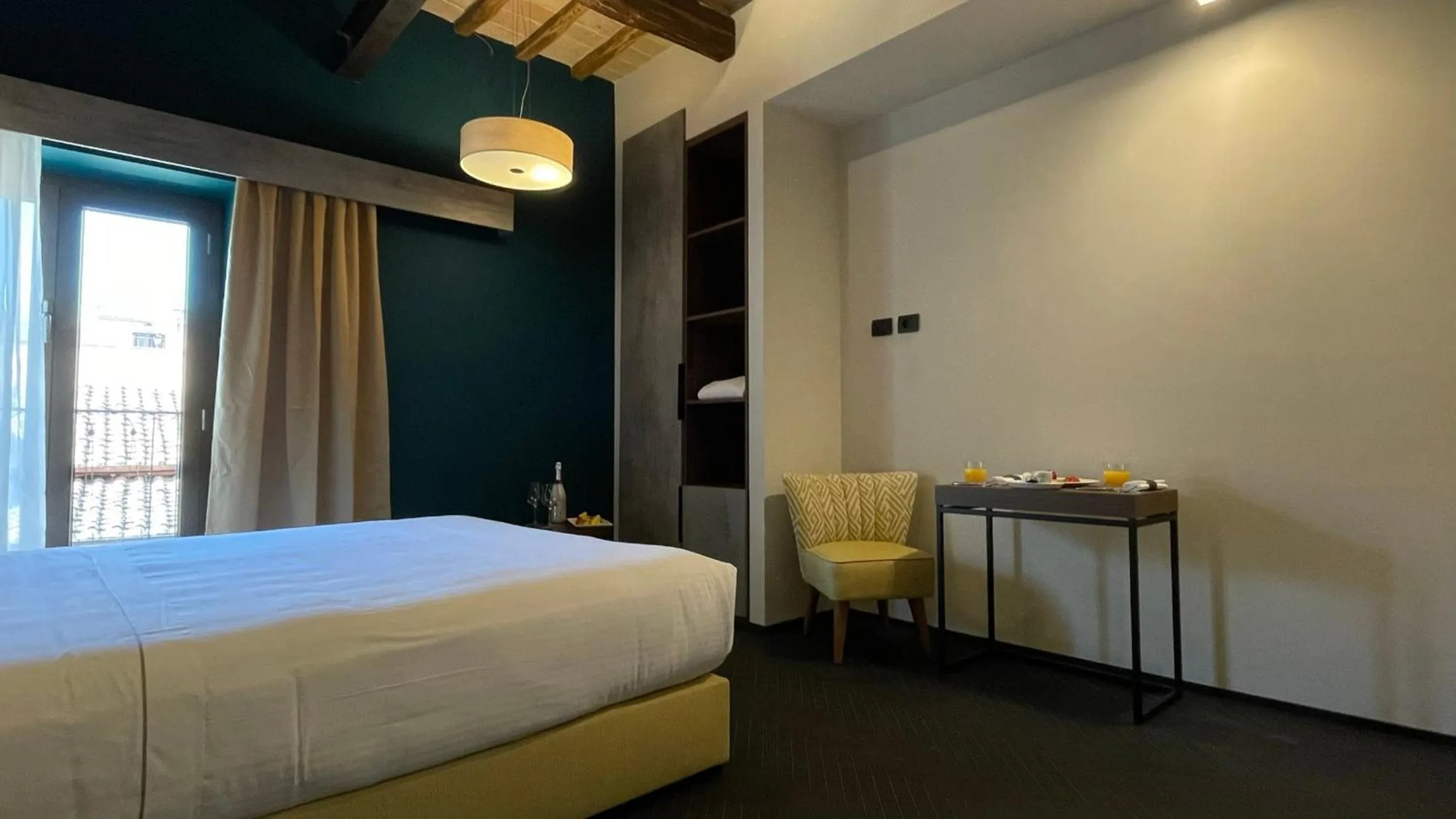 Bed in Passpartout Boutique Palace