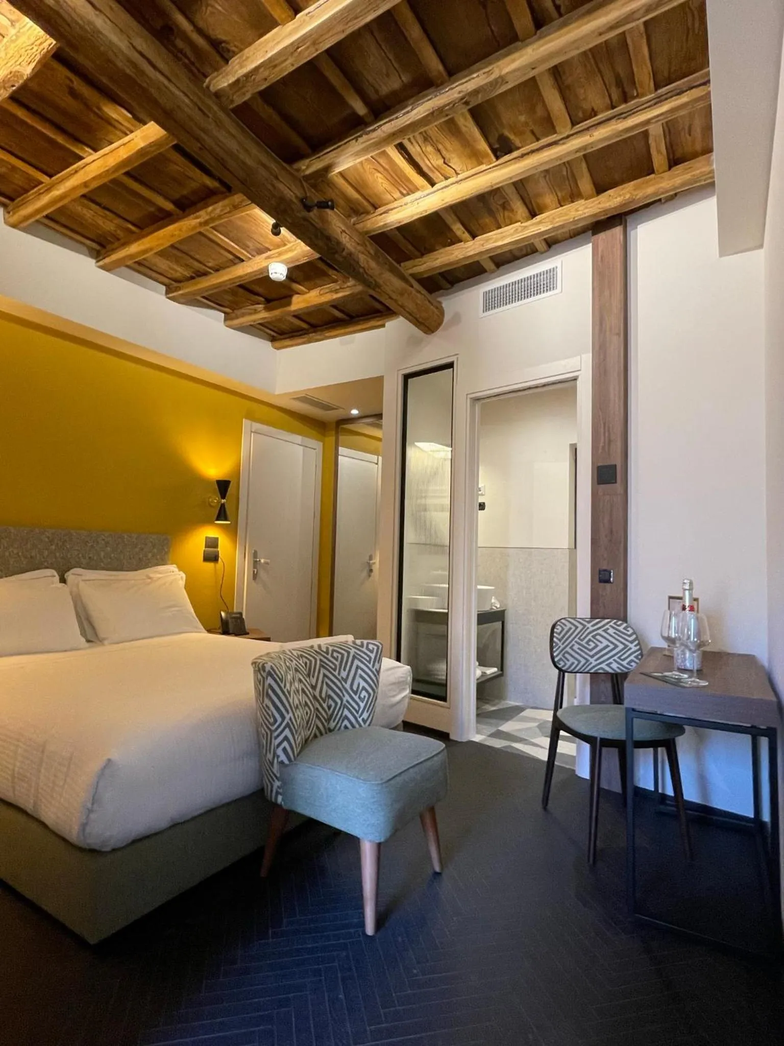 Bed in Passpartout Boutique Palace