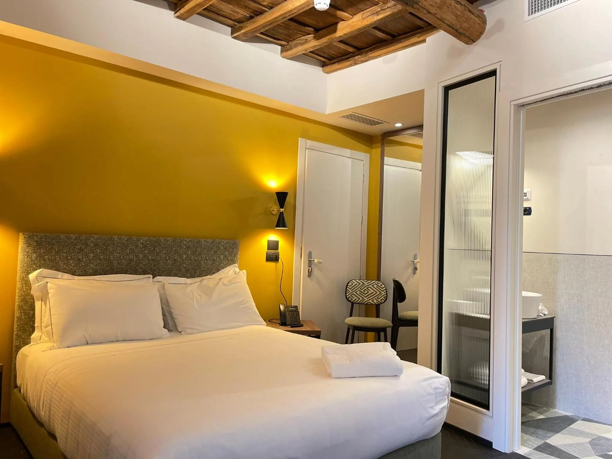 Bed in Passpartout Boutique Palace