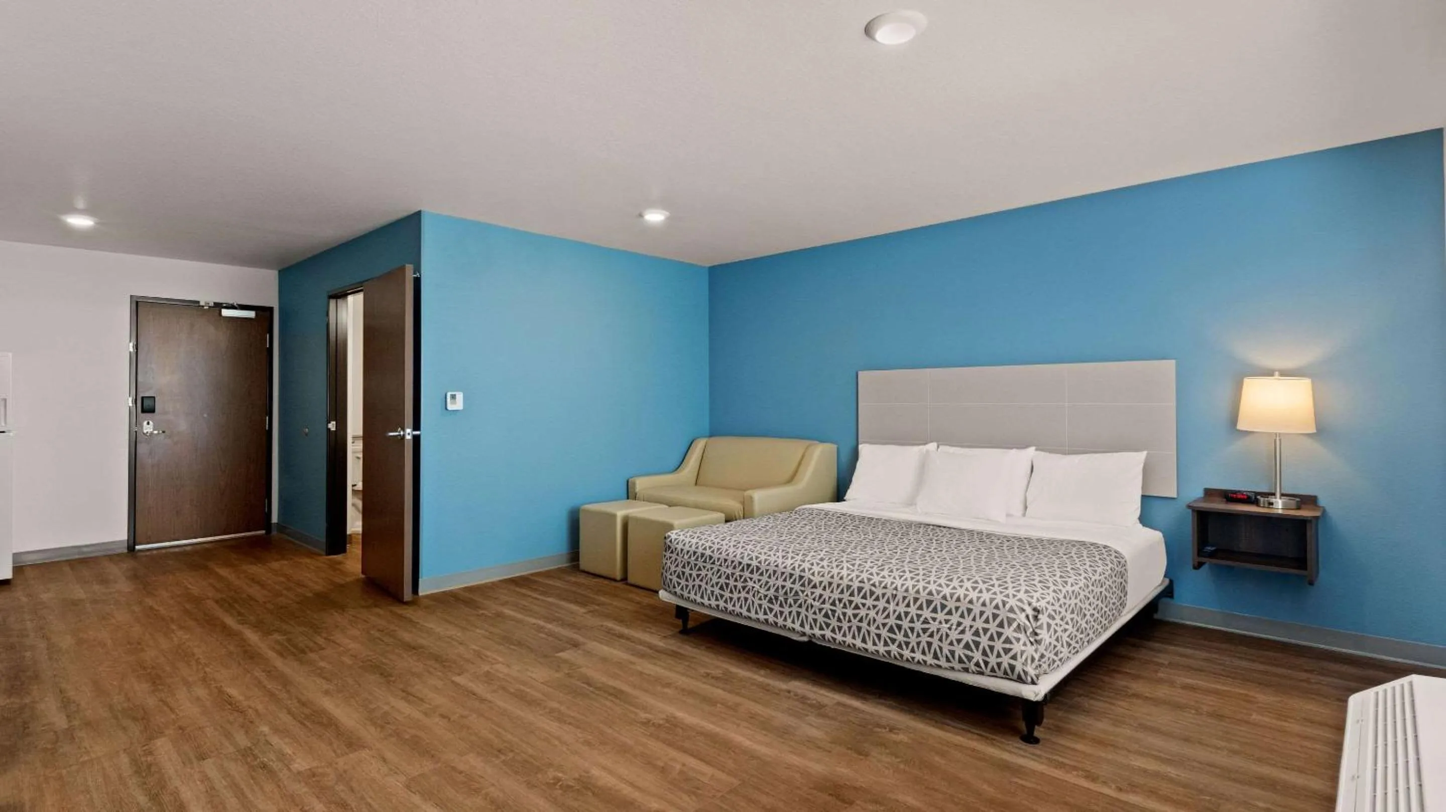 Bedroom in WoodSpring Suites Greeley