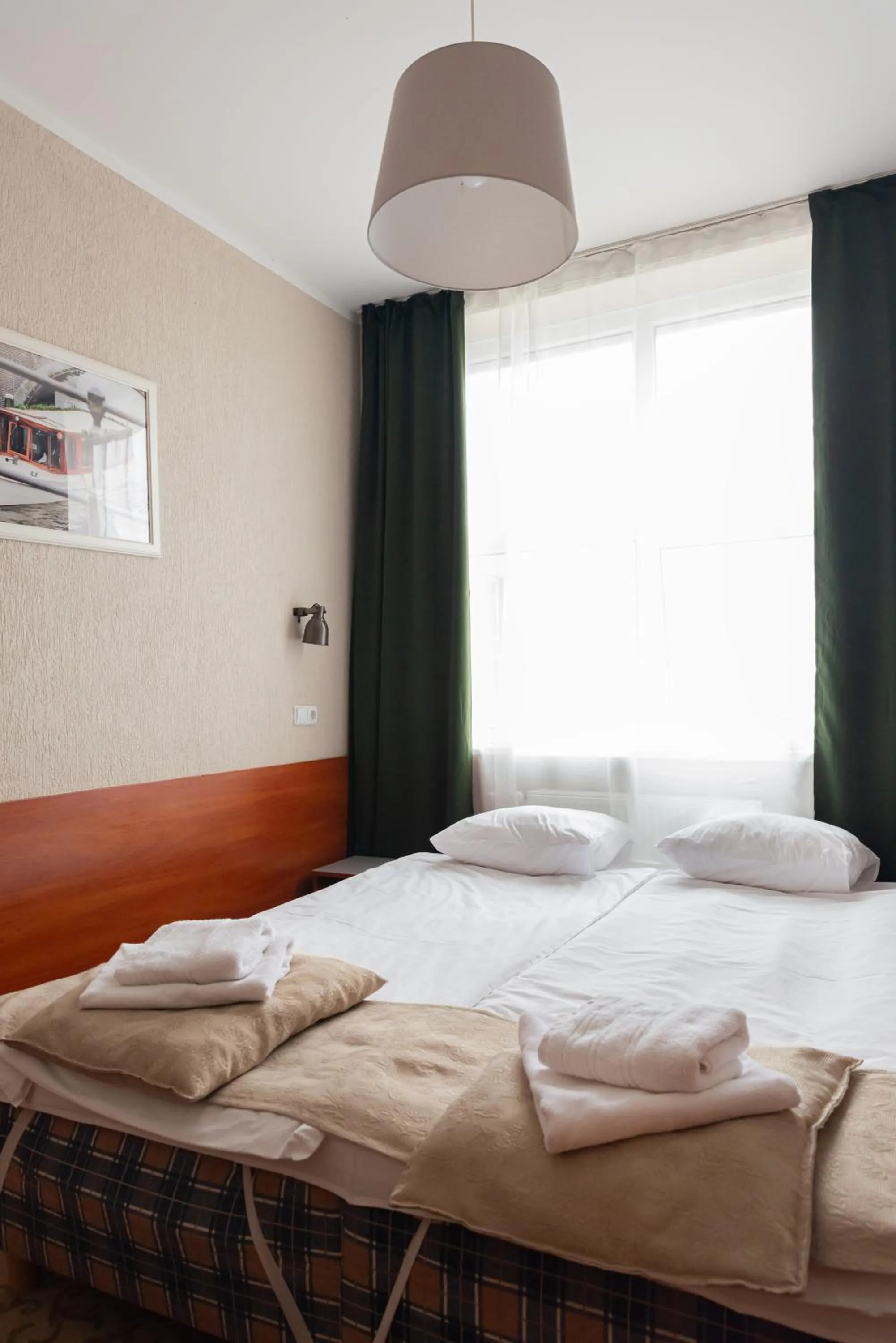 Bed in Inza Guest House