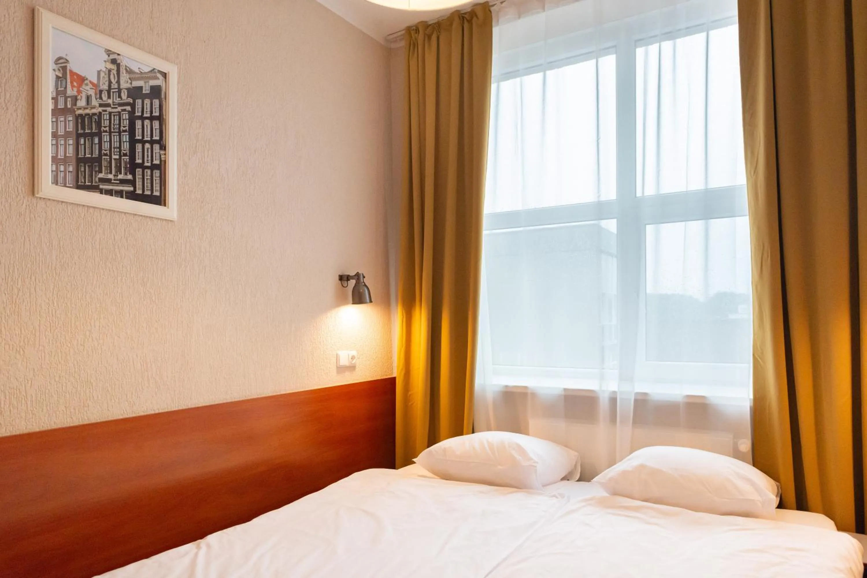 Bed in Inza Guest House