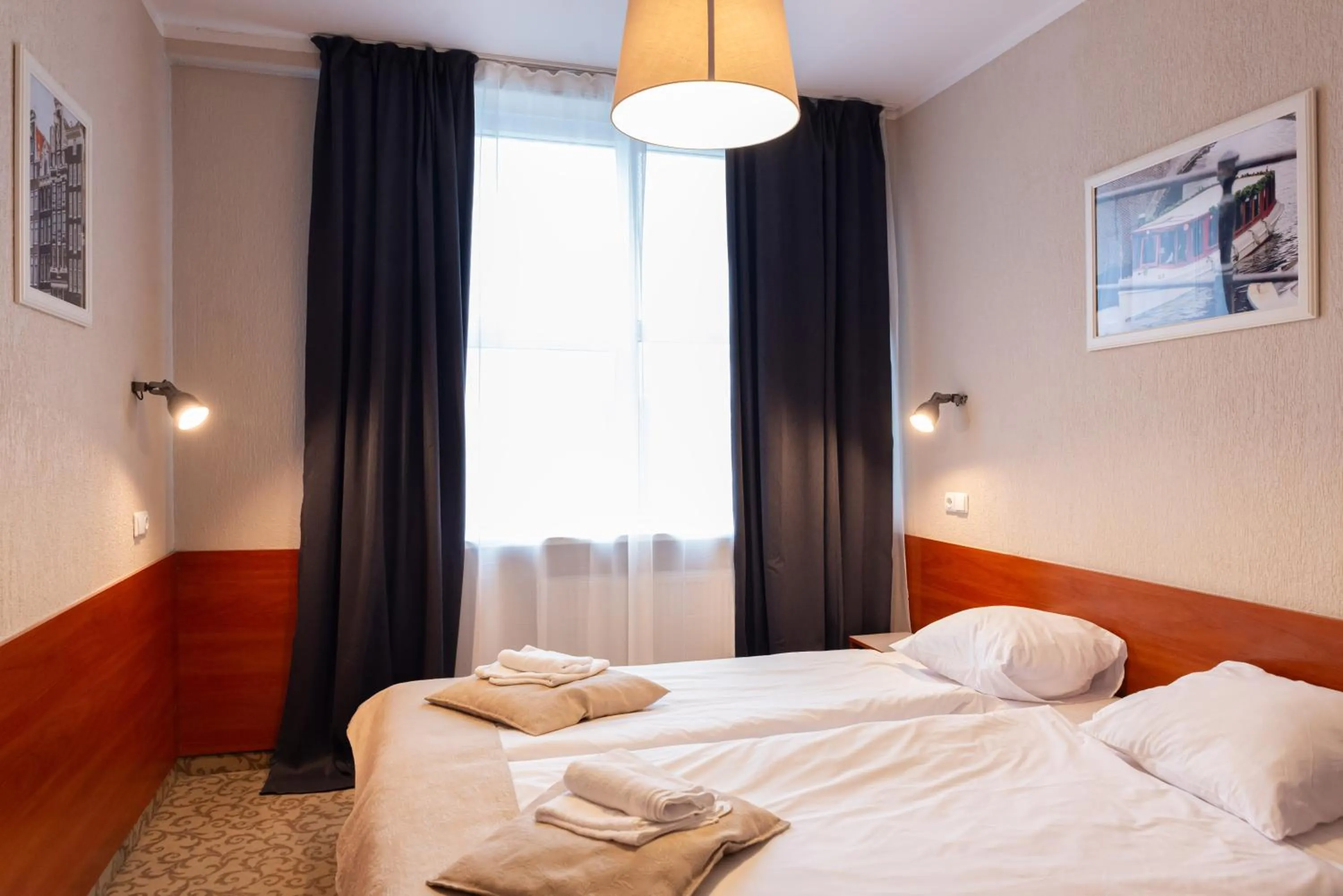 Bed in Inza Guest House