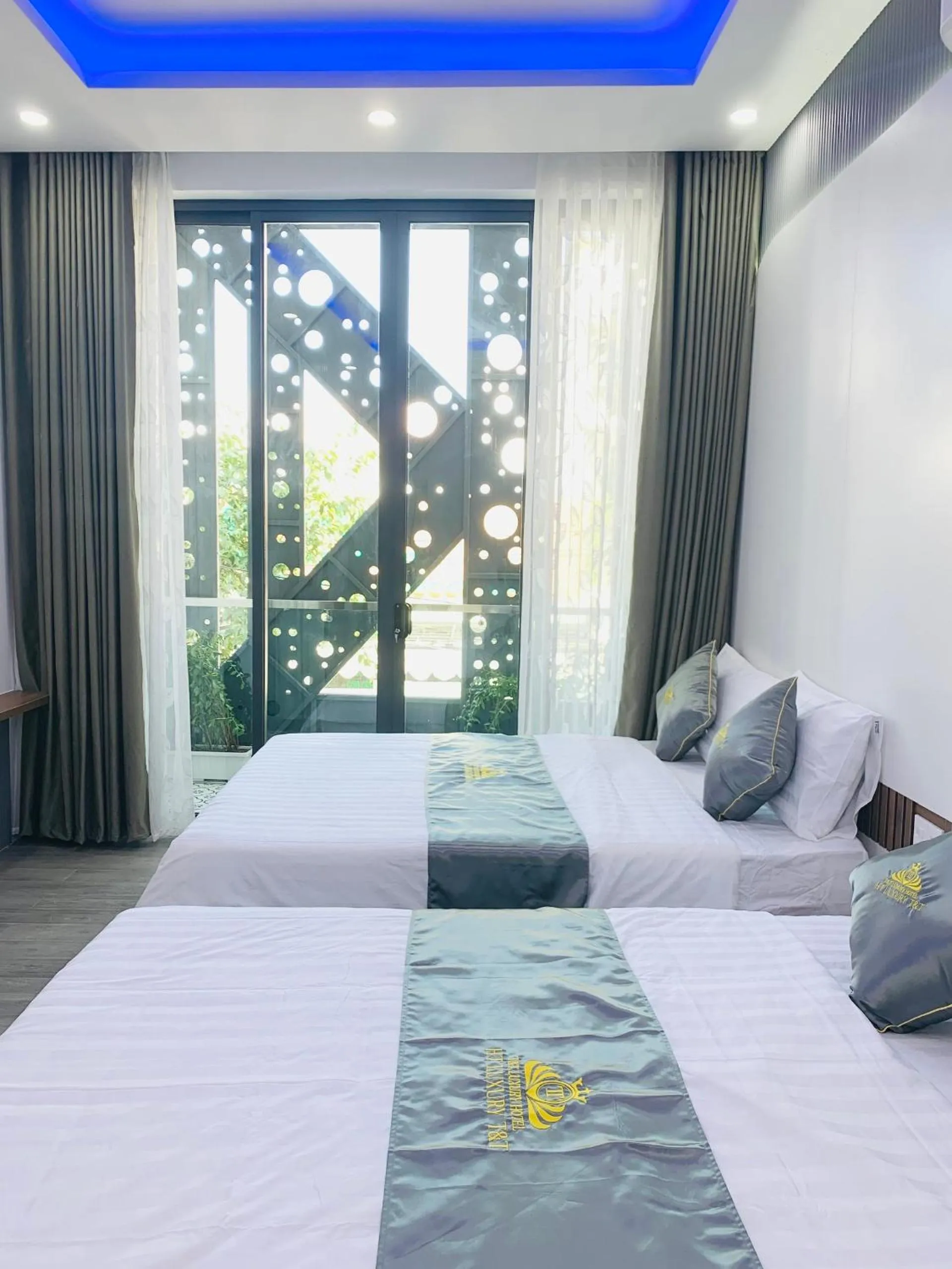 Bed in T&T Luxury Hotel